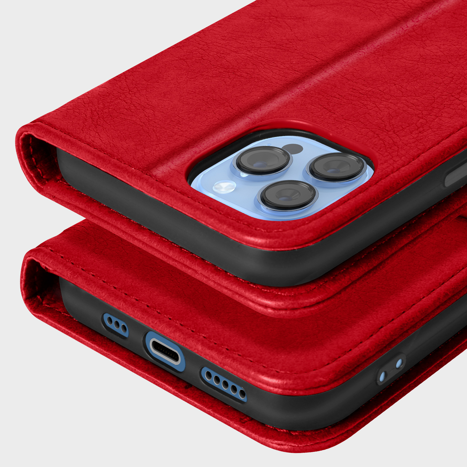 Twee rode leren telefoonhoesjes gestapeld, close-up van camera's en poorten.