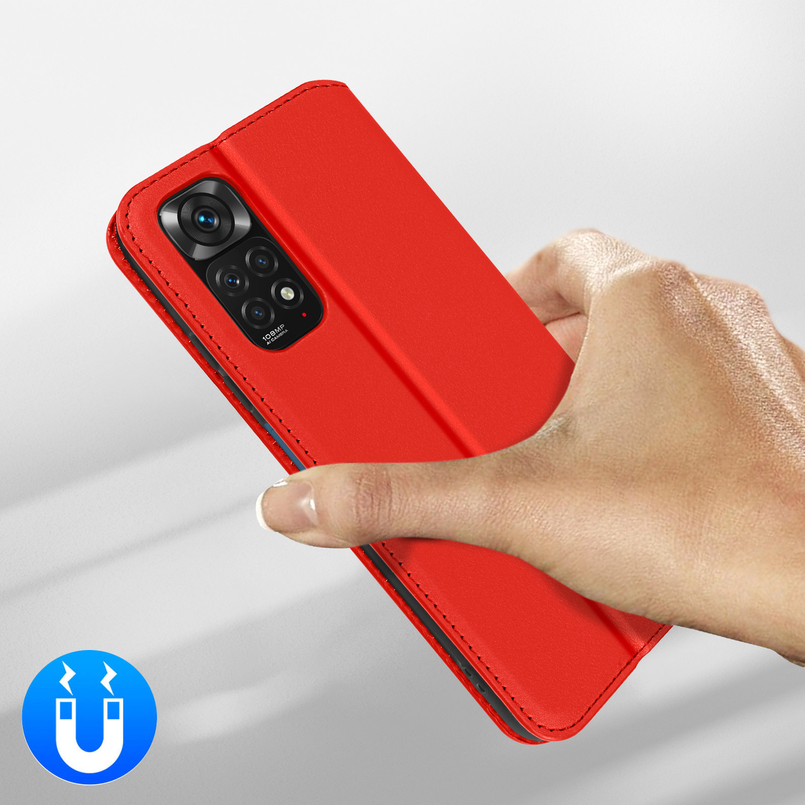 Étui de téléphone rouge à fermeture magnétique et appareil photo. Main tenant l'étui.