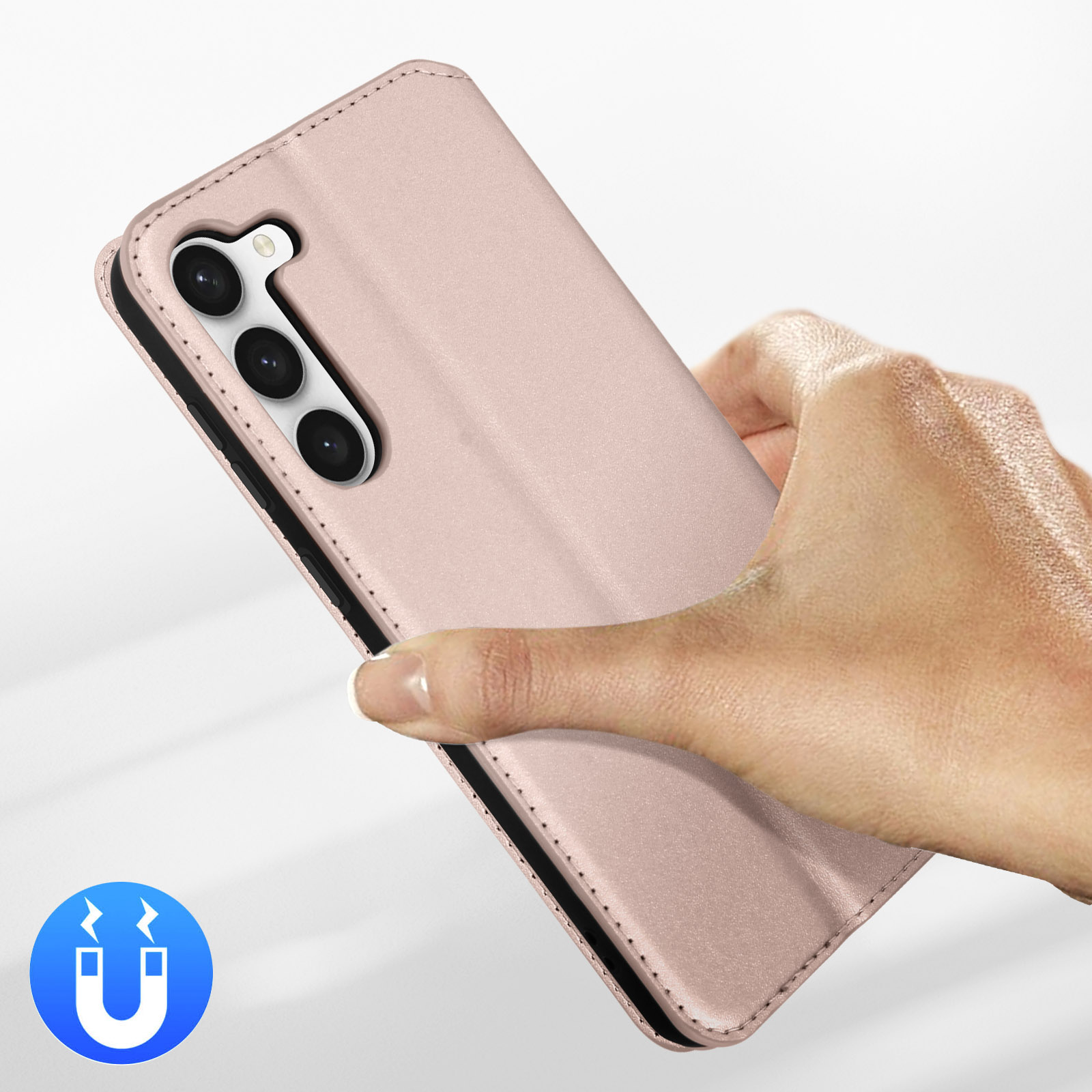 Une main tient un étui rose pour téléphone avec trois objectifs. Icône aimant à gauche.