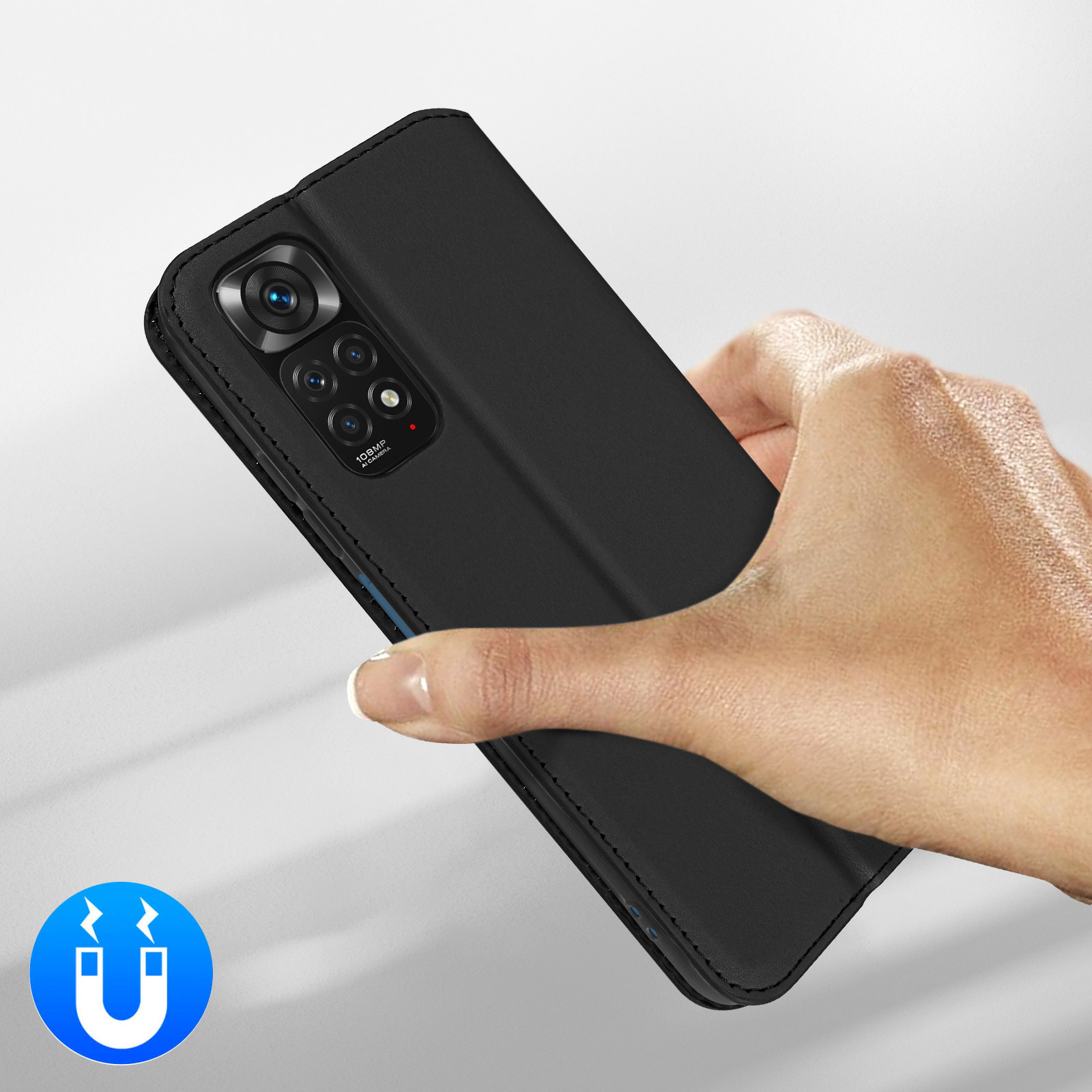 Une main tient un étui de téléphone noir avec découpe caméra et icône aimant.