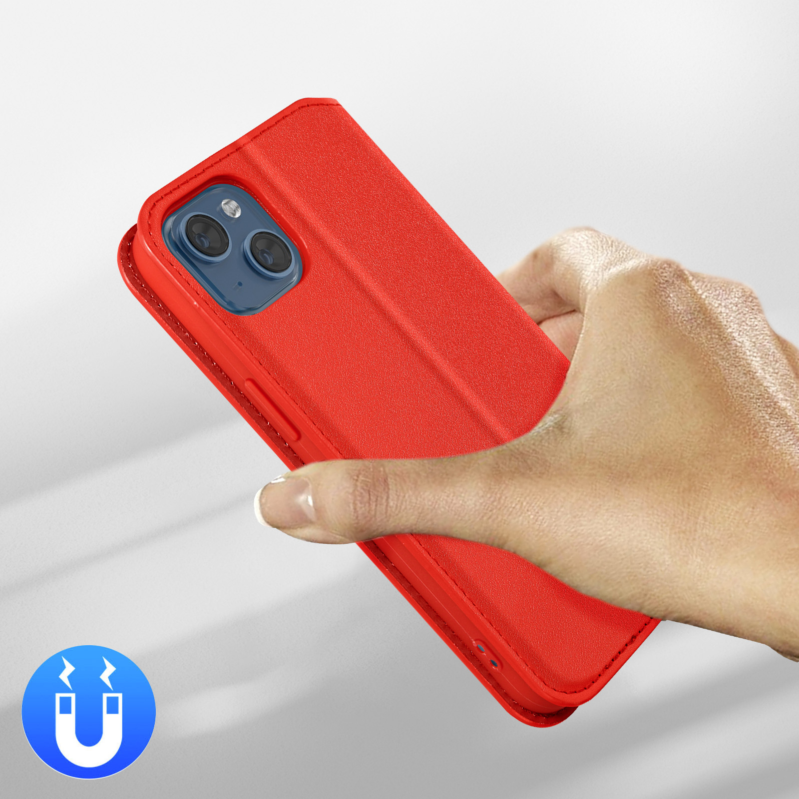 Étui de téléphone rouge tenu par une main.