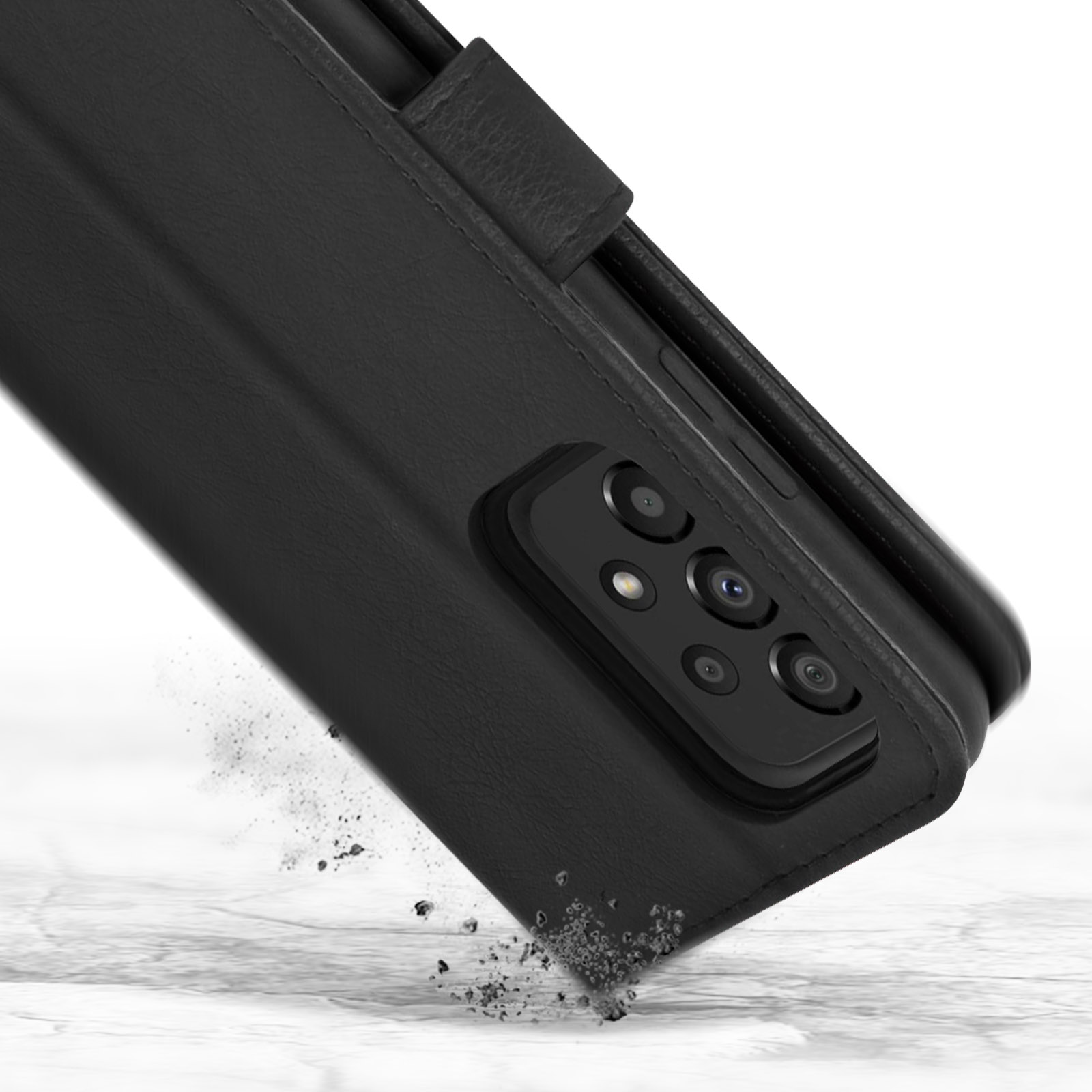 Étui de téléphone noir avec bloc caméra basculant. Poussière en suspension.