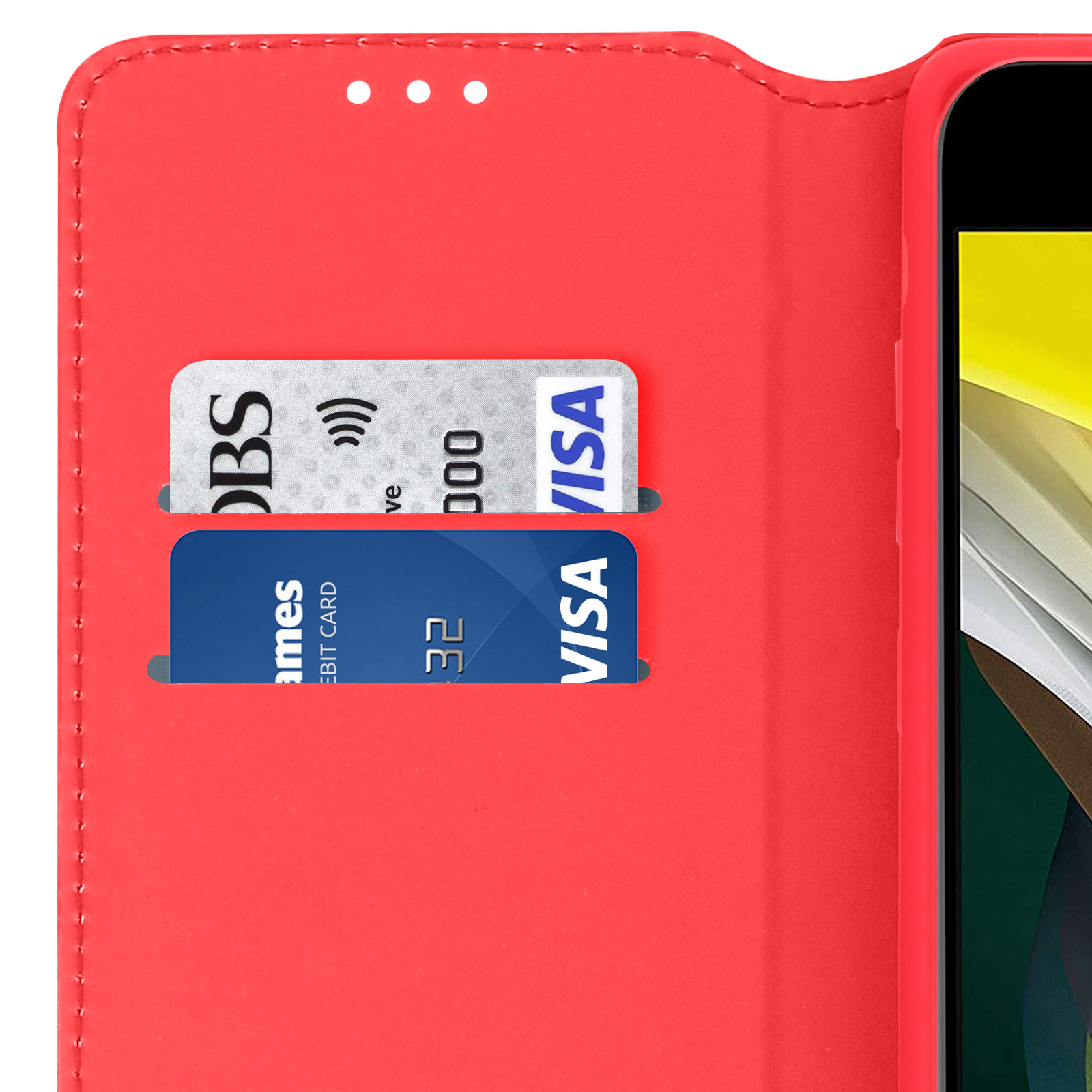Étui rouge avec deux fentes pour cartes, une carte DBS et une carte Visa.