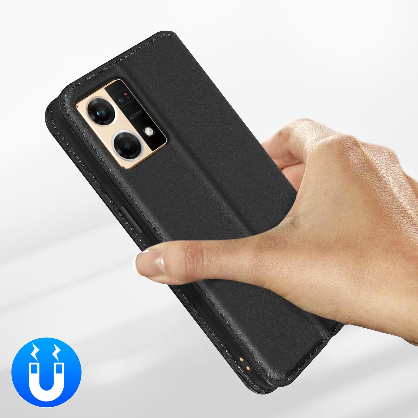 Téléphone noir tenu par une main, avec une icône aimant à proximité.