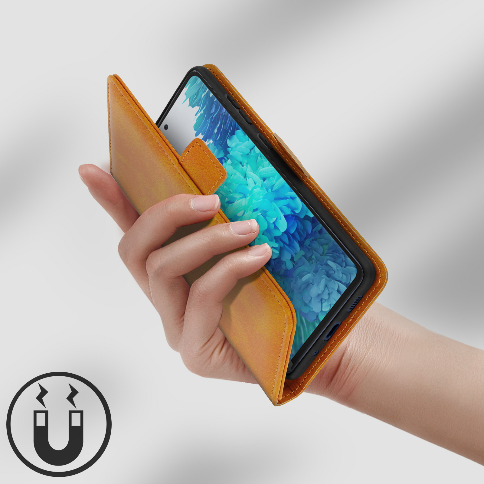Une main tenant un étui de téléphone orange avec un smartphone.