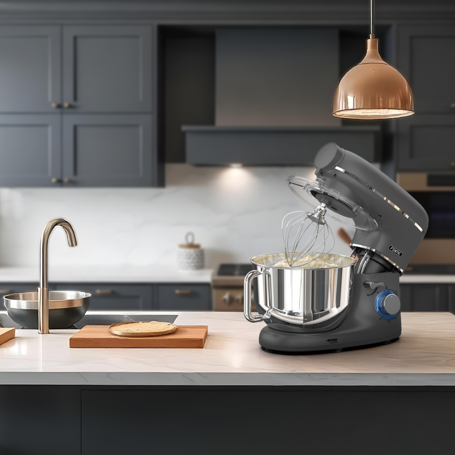 A dark grey stand mixer with a whisk attachment is in a modern kitchen.