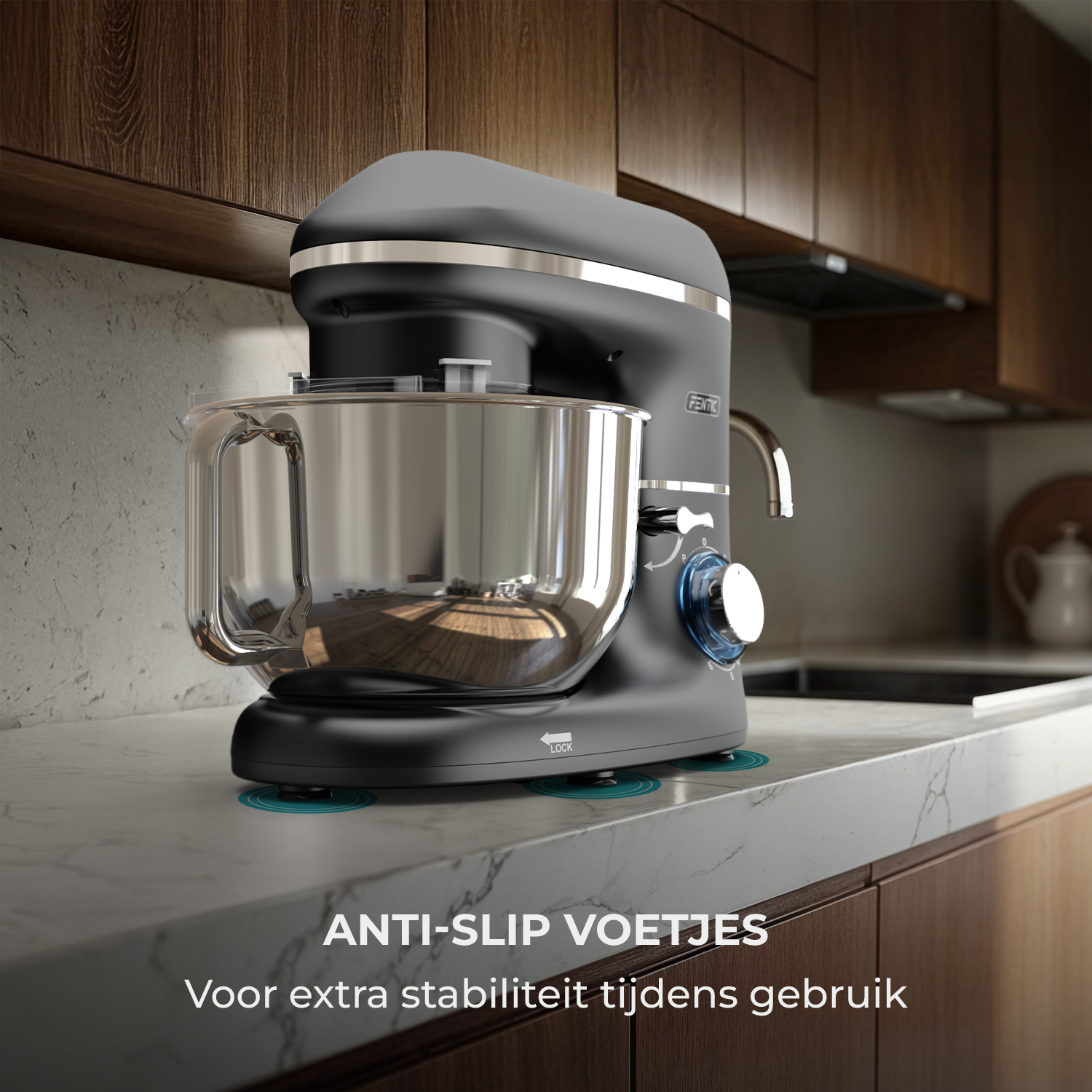 A black stand mixer with a stainless steel bowl rests on a marble countertop.