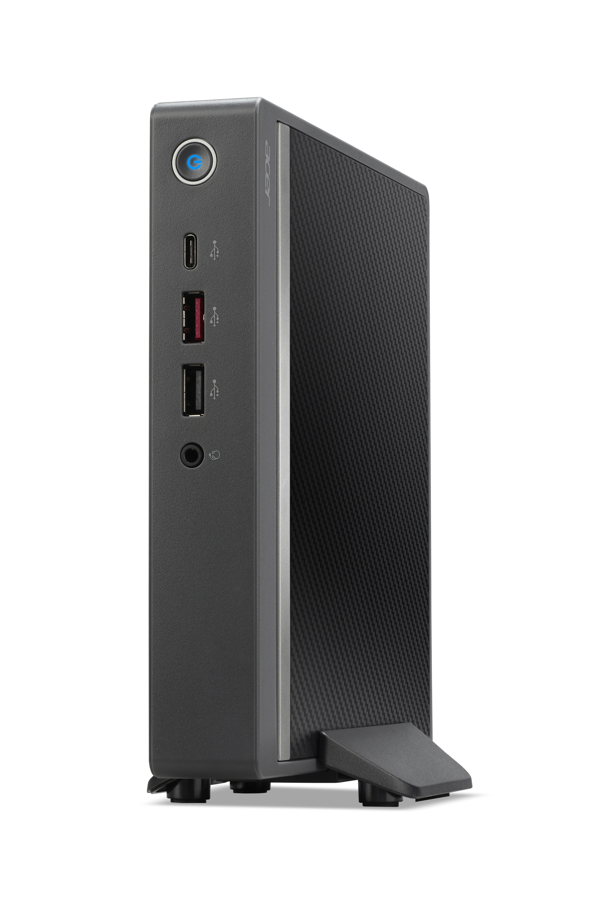 Un mini PC Acer grigio è in piedi su un supporto, mostrando le porte sul lato.