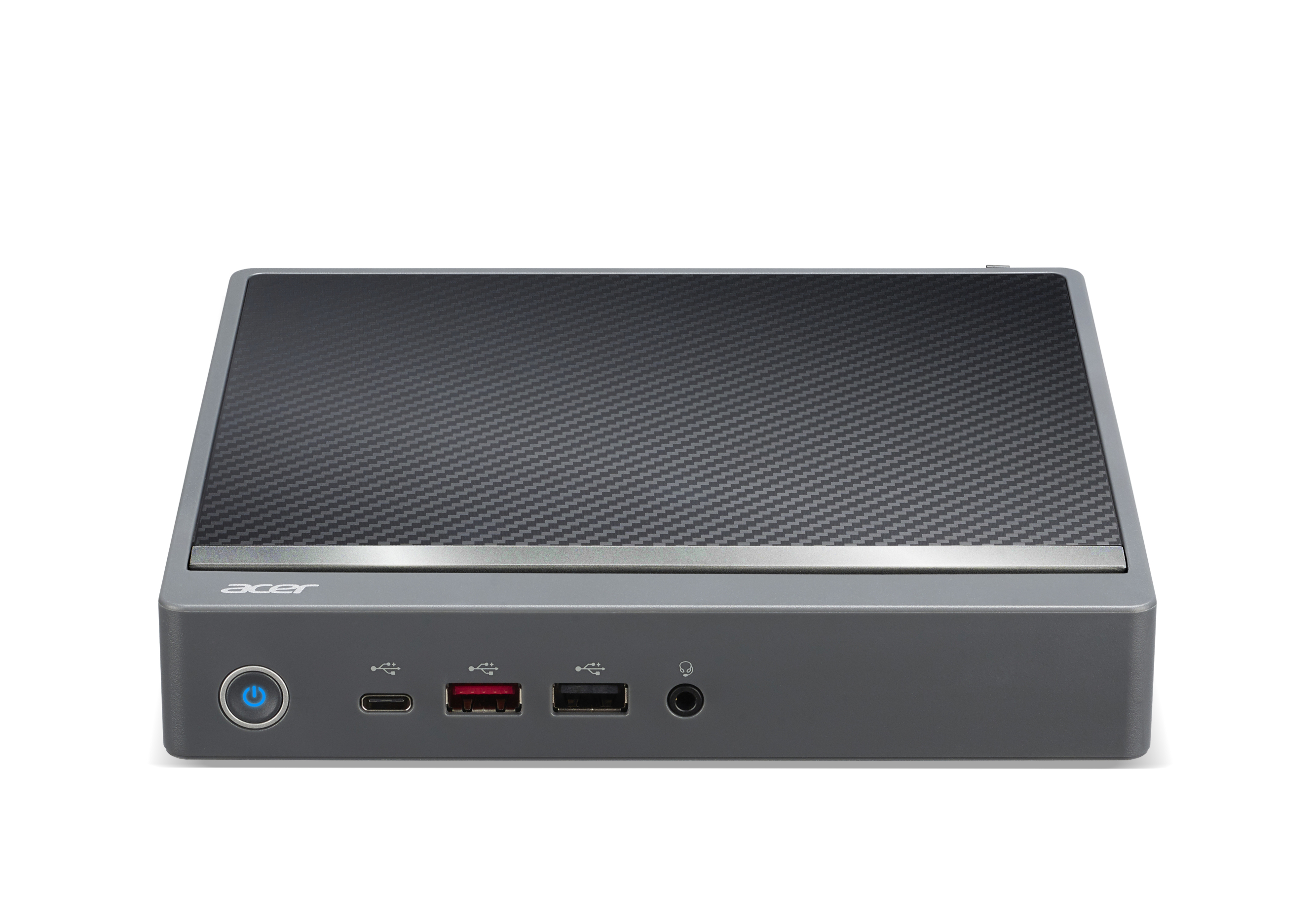 Mini PC Acer grigio con top a motivo carbonio e porte.