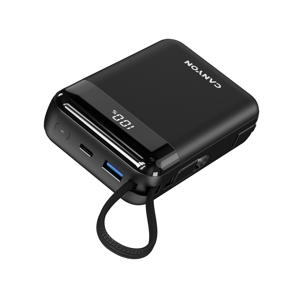 Czarny power bank Canyon ze wskaźnikiem naładowania 100% i portem USB.