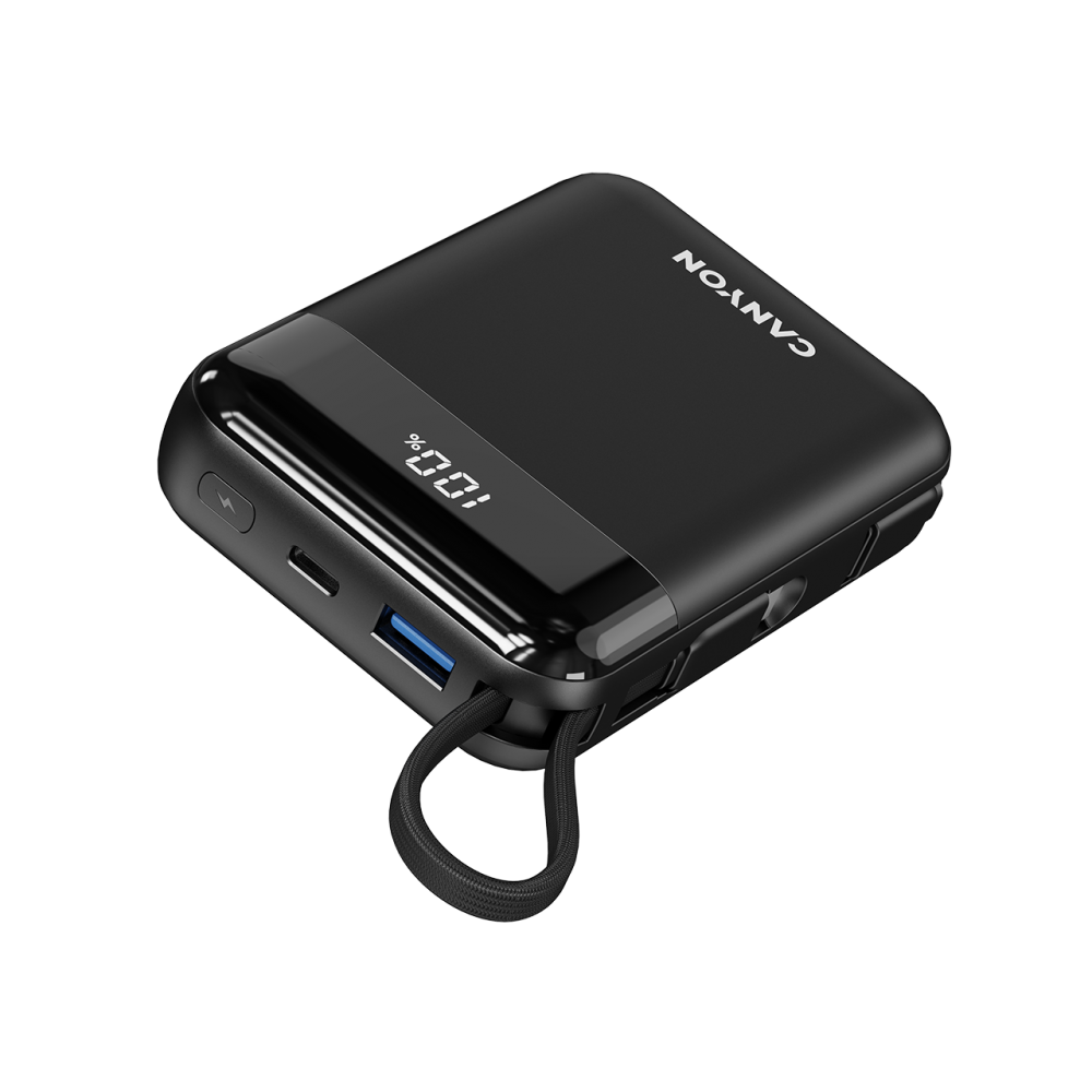 Czarna powerbanka Canyon z wyświetlaczem 100% i portem USB.