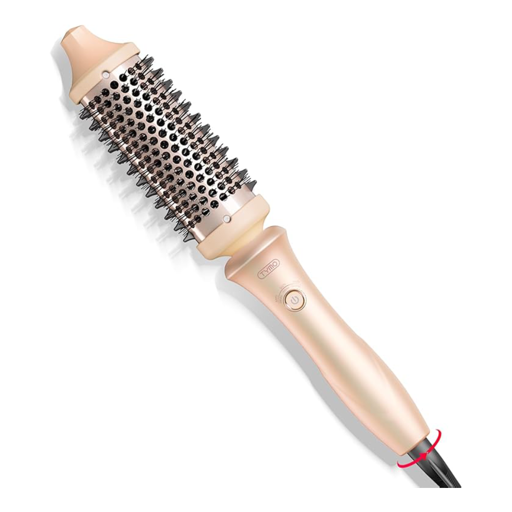 Un arricciacapelli rotante color oro con setole e manico.