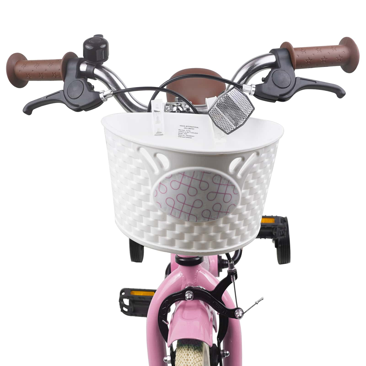 Rosa Kinderfahrrad mit weißem Korb, braunen Griffen und Klingel.