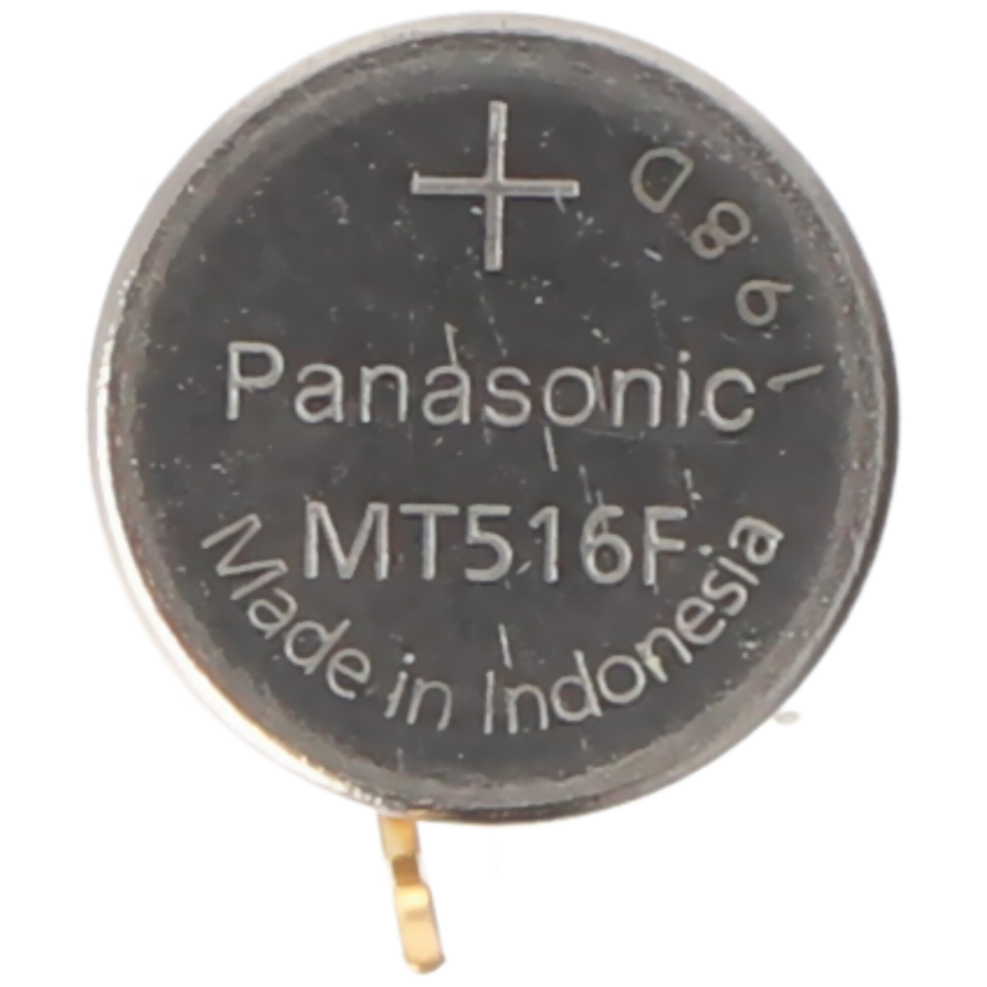 Eine Panasonic MT516F Knopfzelle, hergestellt in Indonesien, mit einem Pluszeichen.