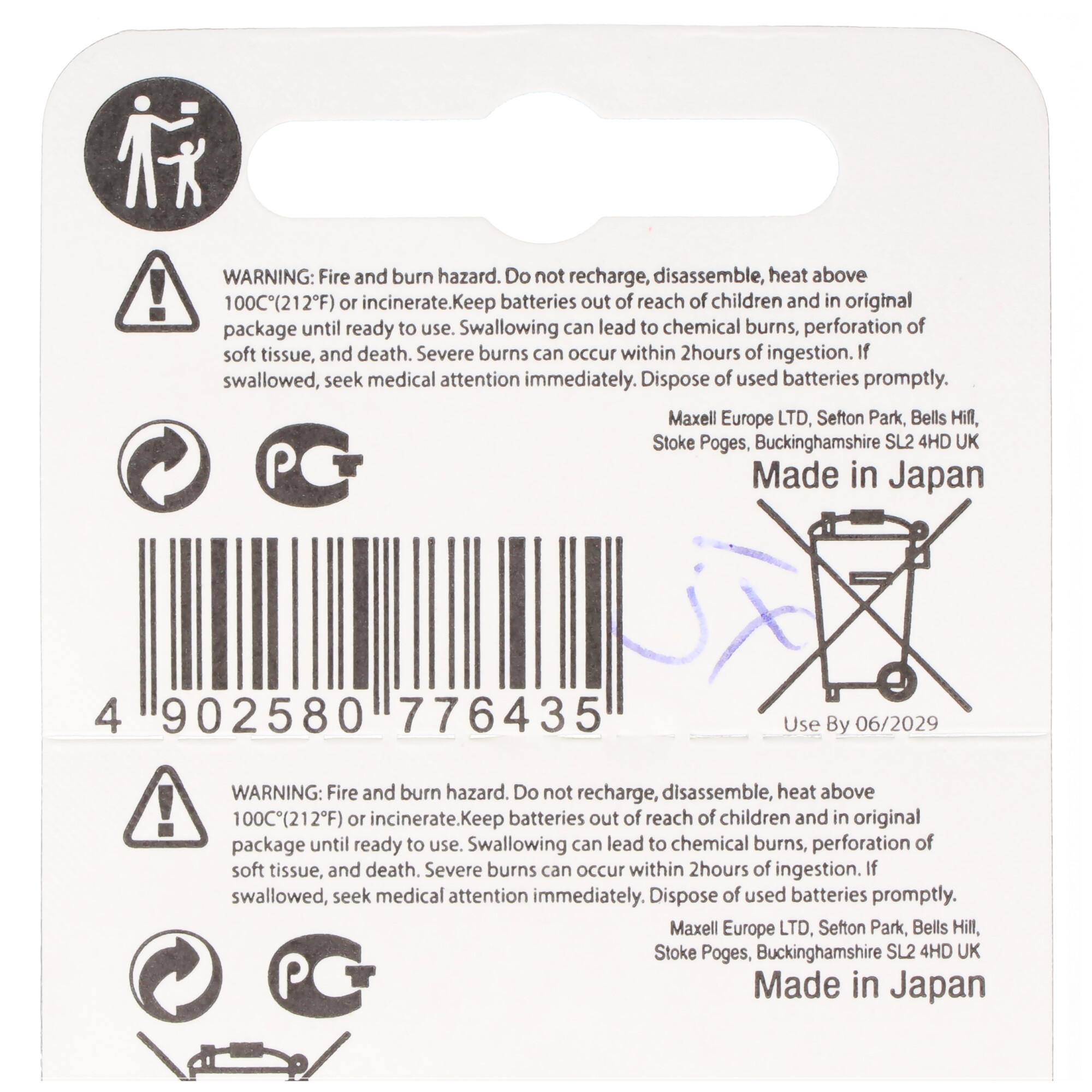 Warnhinweise für Batterien, Barcode und Herkunftsland auf weißem Hintergrund.