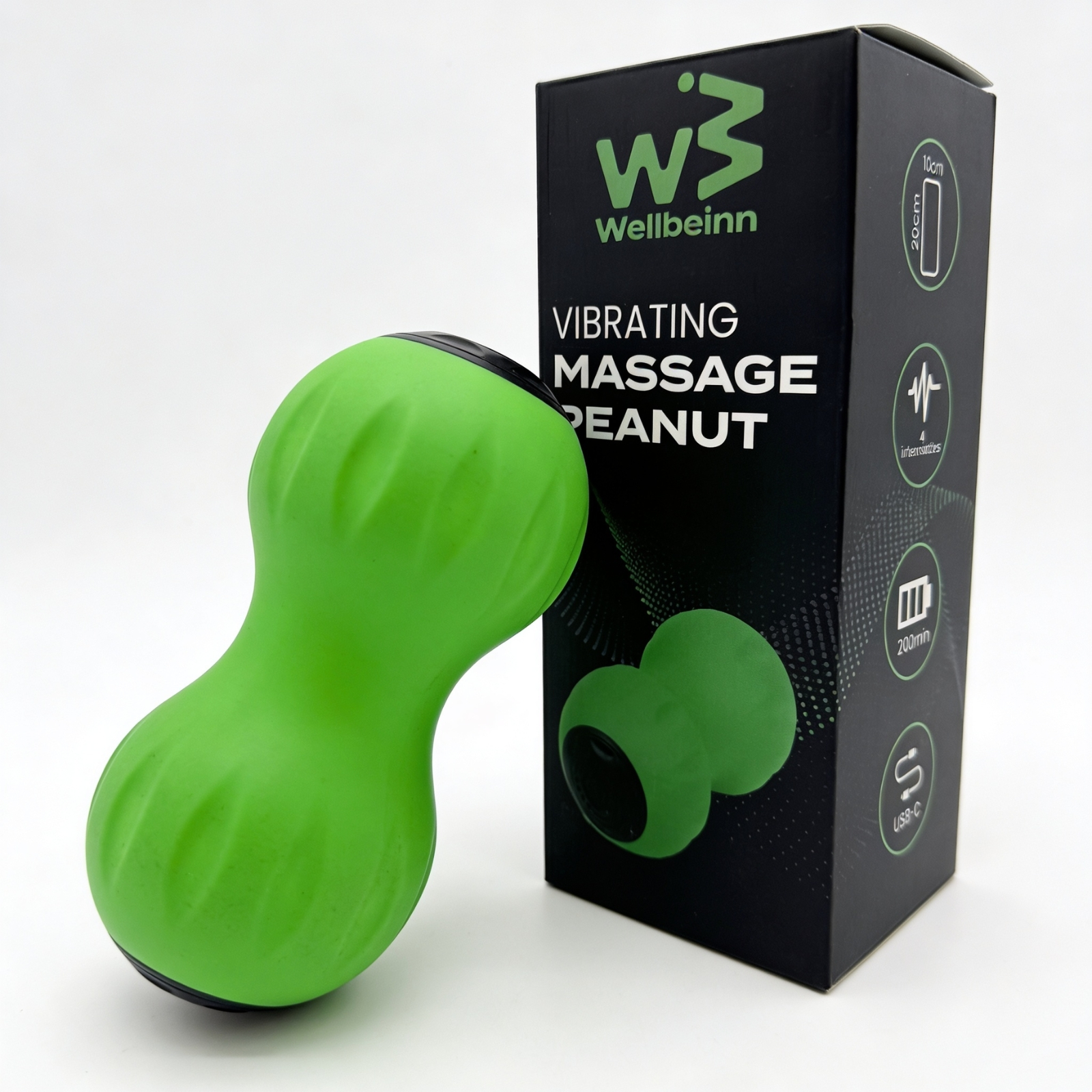 Pelota de masaje verde con forma de cacahuete junto a una caja negra con información.