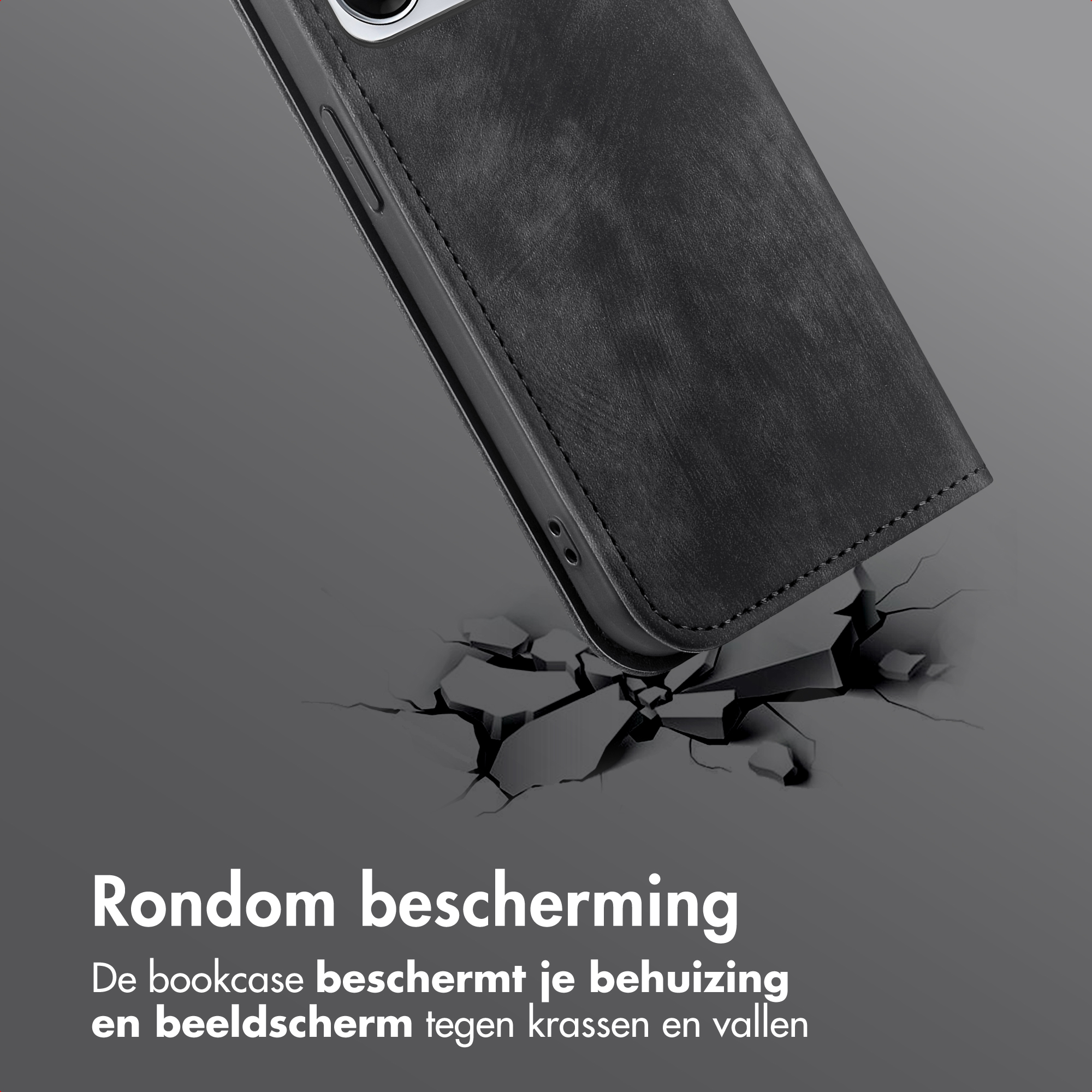 Zwarte telefoonhoes valt op gebarsten grond, toont bescherming.