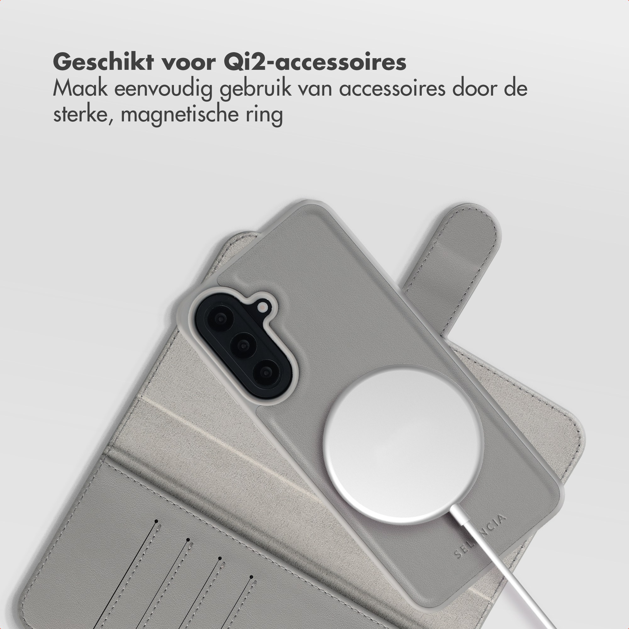 Grijze telefoonhoes met magnetische ring en lader.