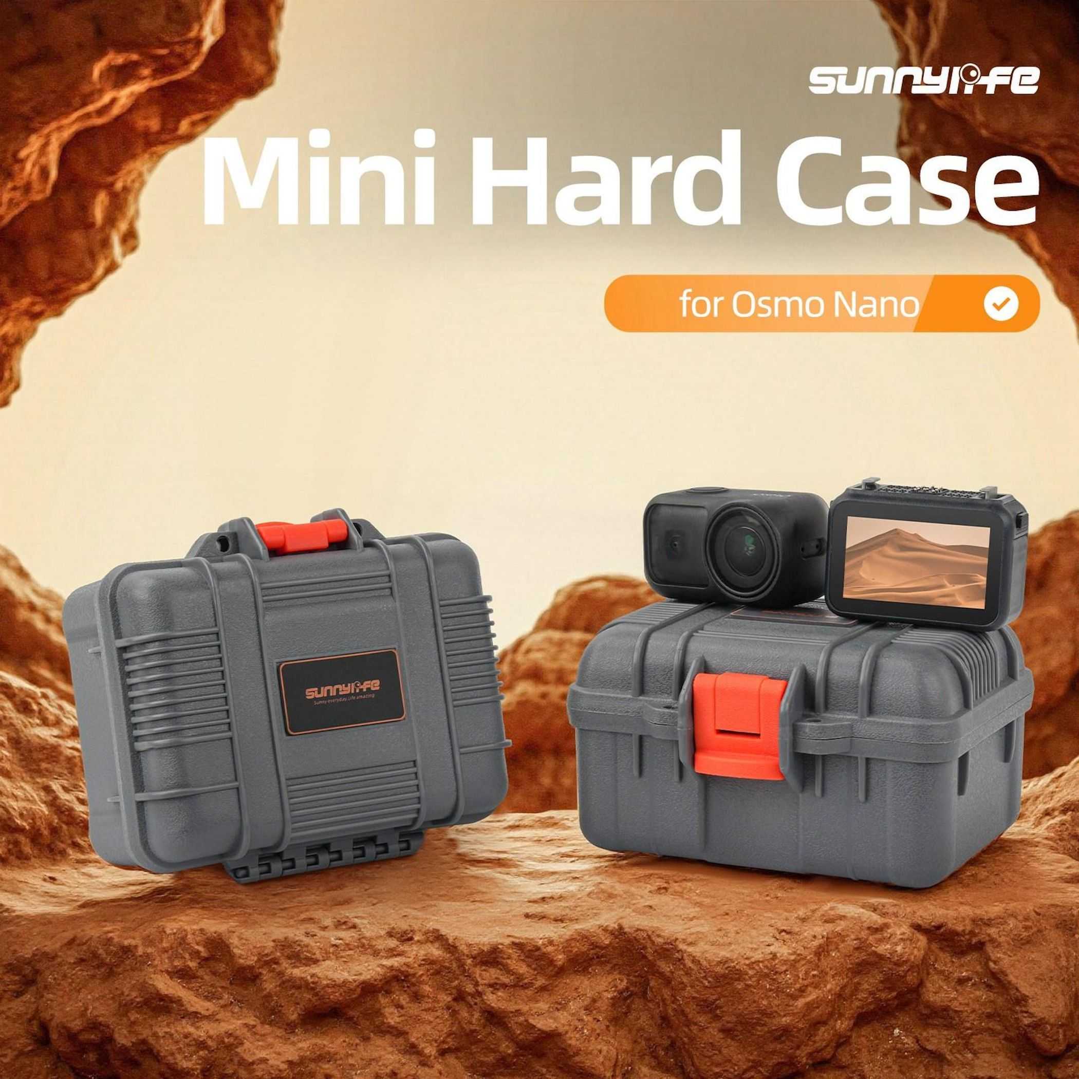 Zwei graue Mini-Hartschalenkoffer mit orangefarbenen Verschlüssen, einer Kamera.