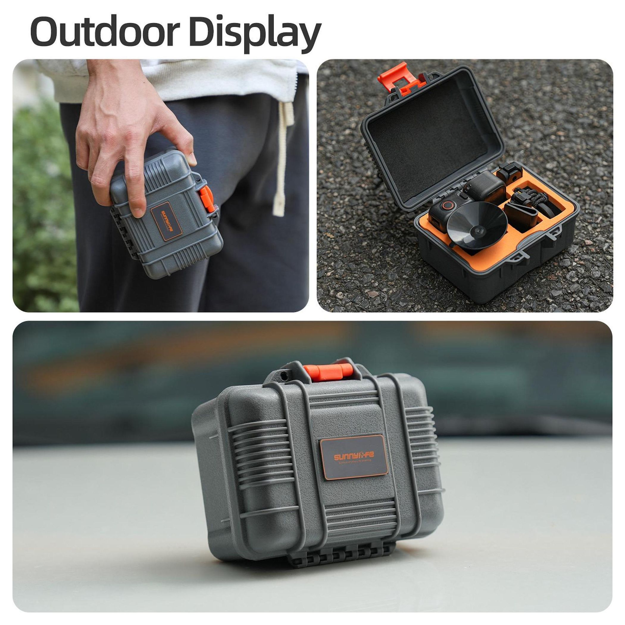 Grauer Outdoor-Koffer mit orangefarbenen Akzenten, enthaltend Kamerazubehör. Hand hält ihn.