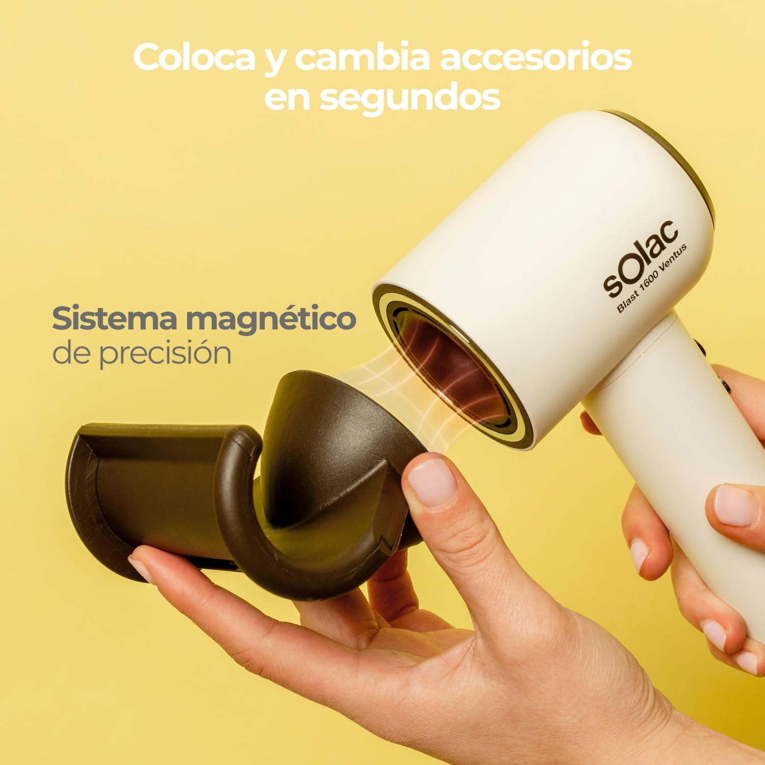 Una boquilla blanca de secador de pelo se acopla magnéticamente a un secador blanco.