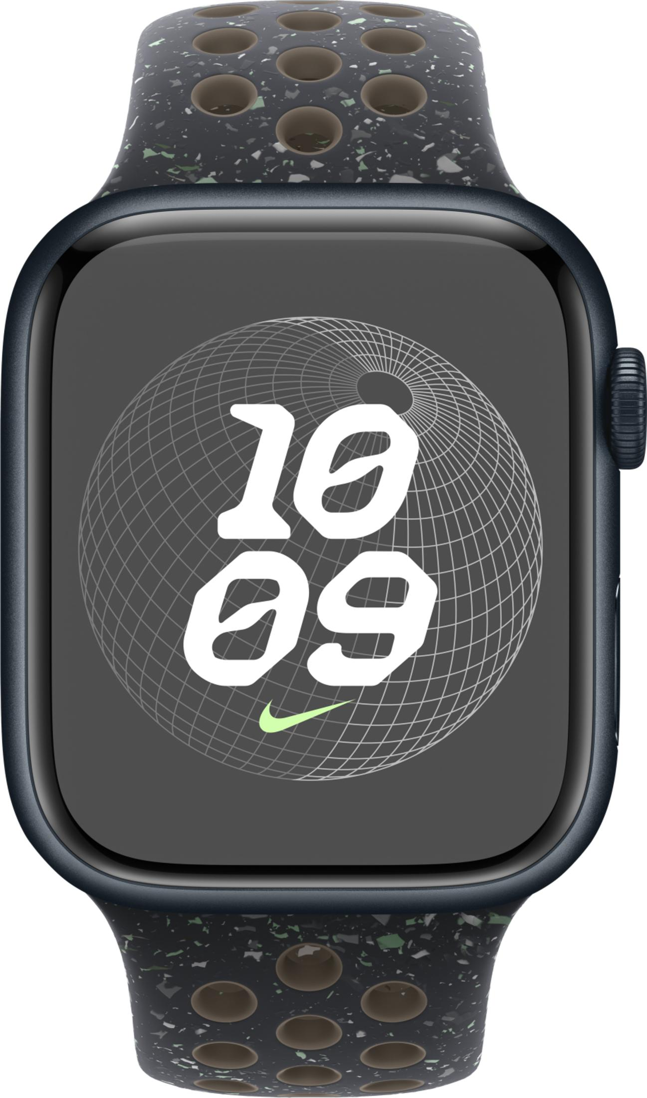 A dark Apple Watch with a perforated band, showing 10:09 on its face.