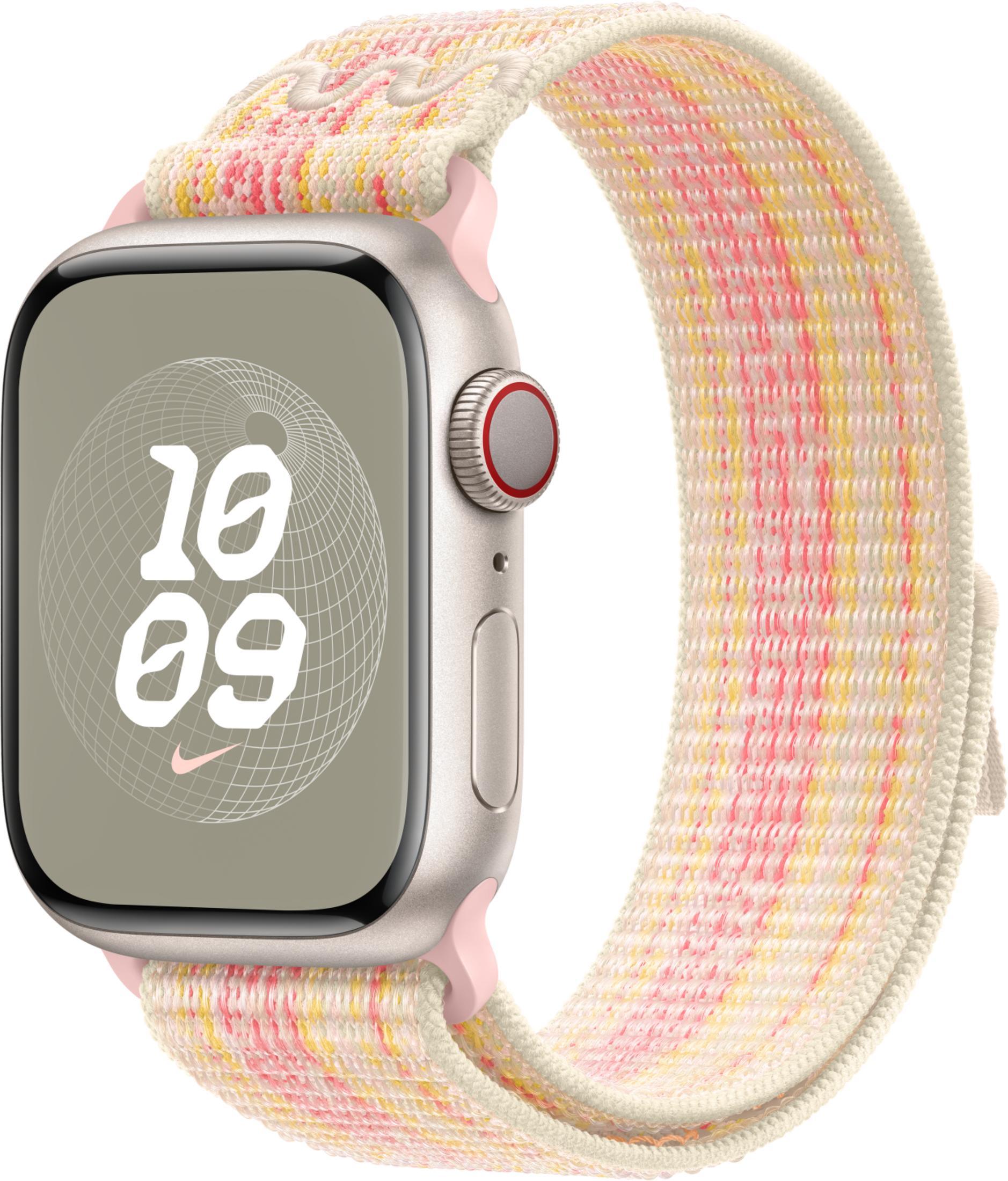 A silver smartwatch with a colorful woven fabric band featuring pink, yellow, and white hues.