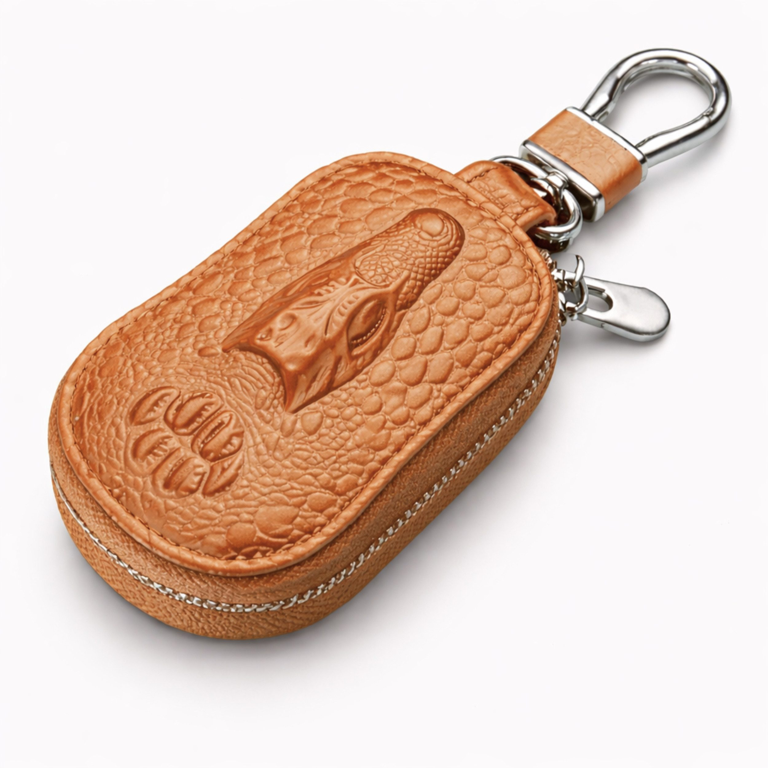 Braune Ledertasche mit Krokodilprägung und Schlüsselanhänger.