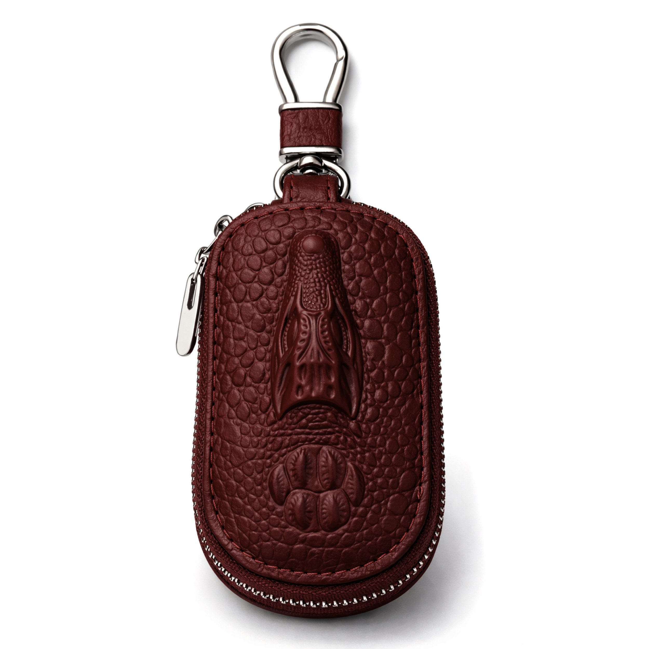 Eine dunkelrote Leder-Schlüsseltasche mit Krokodilprägung und silbernem Reißverschluss.