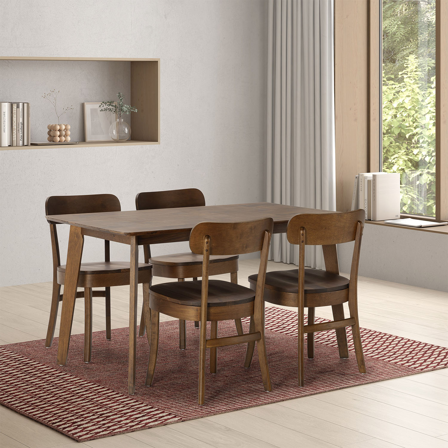 Una mesa de comedor de madera con cuatro sillas sobre una alfombra roja y blanca.