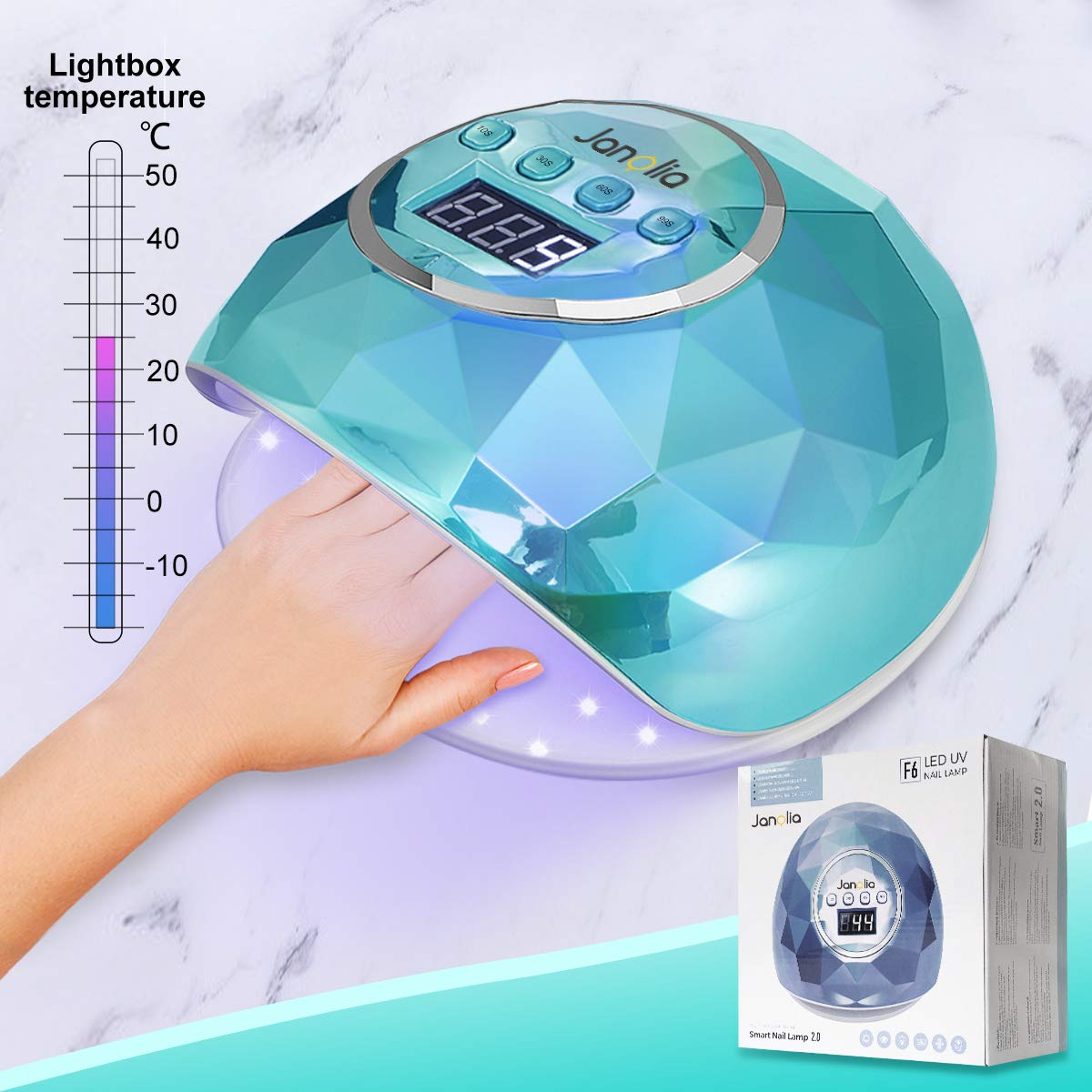 Eine Hand liegt unter einer türkisfarbenen UV-Nagellampe mit digitaler Anzeige.