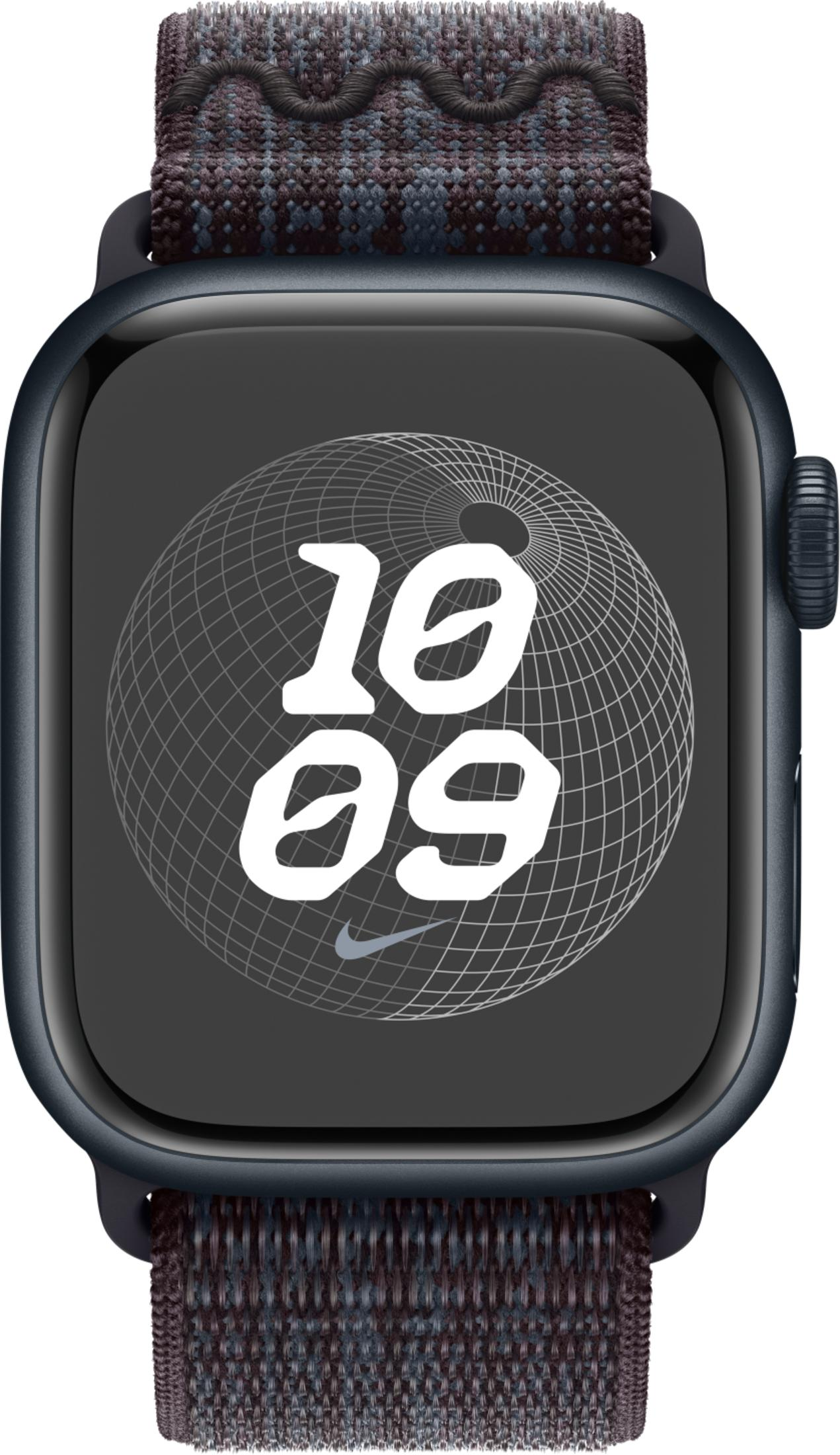 Close-up of a dark smartwatch displaying a geometric face with a Nike logo.