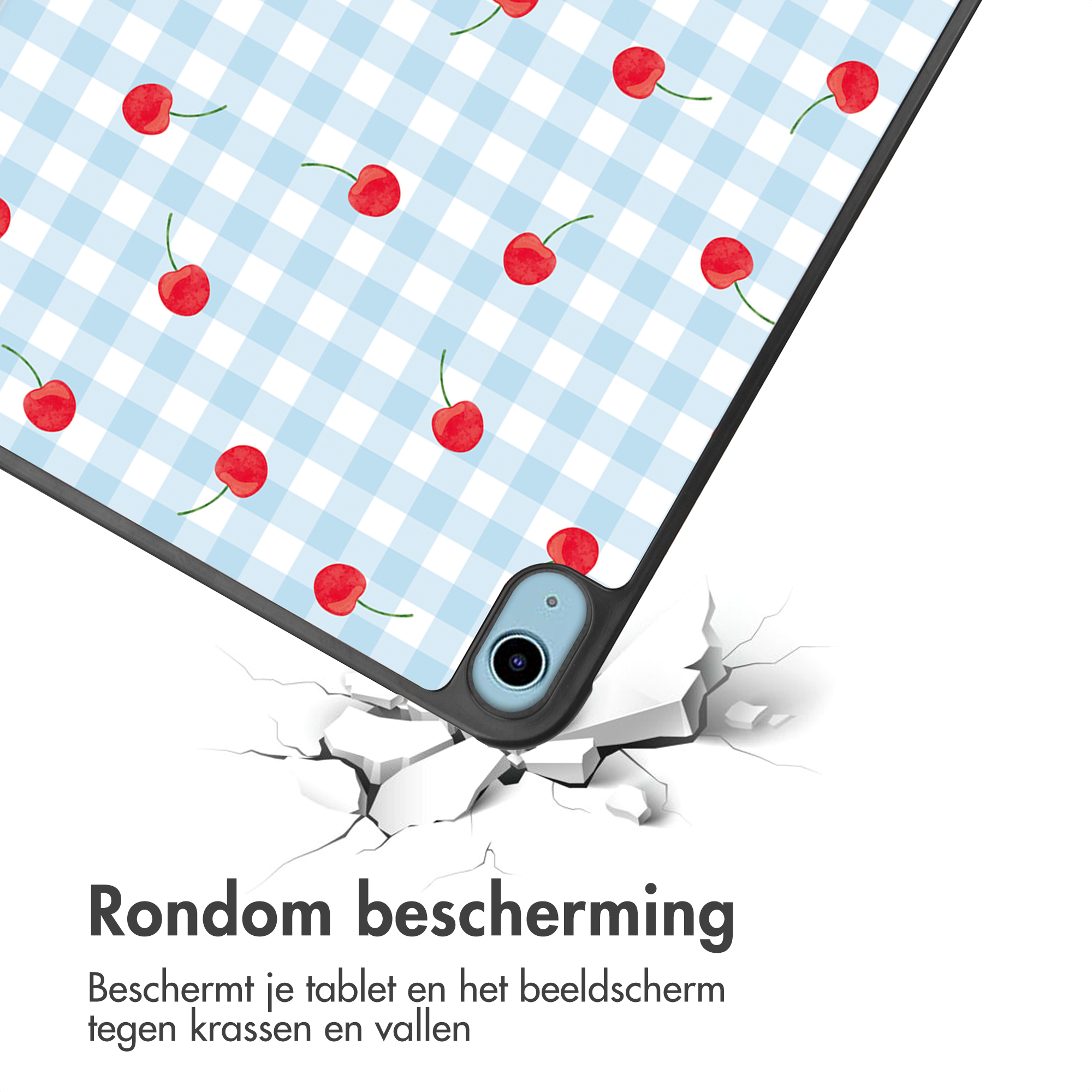 Een tablet met kersenpatroon op blauwe ruitjes valt naar beneden.