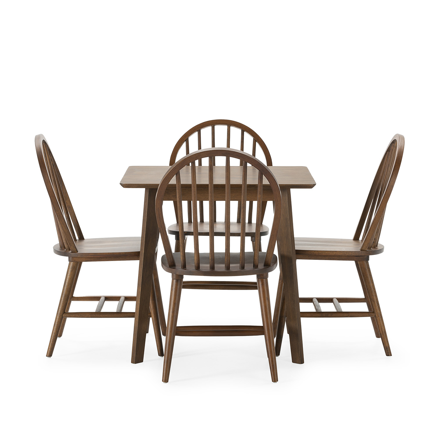 Una mesa de comedor de madera con cuatro sillas, estilo Windsor, sobre fondo blanco.