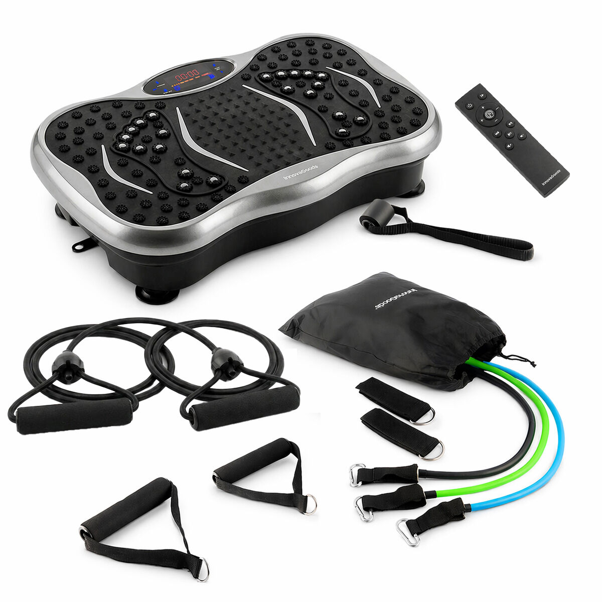 Vibrationsplatte mit Fernbedienung und Zubehör wie Widerstandsbändern.