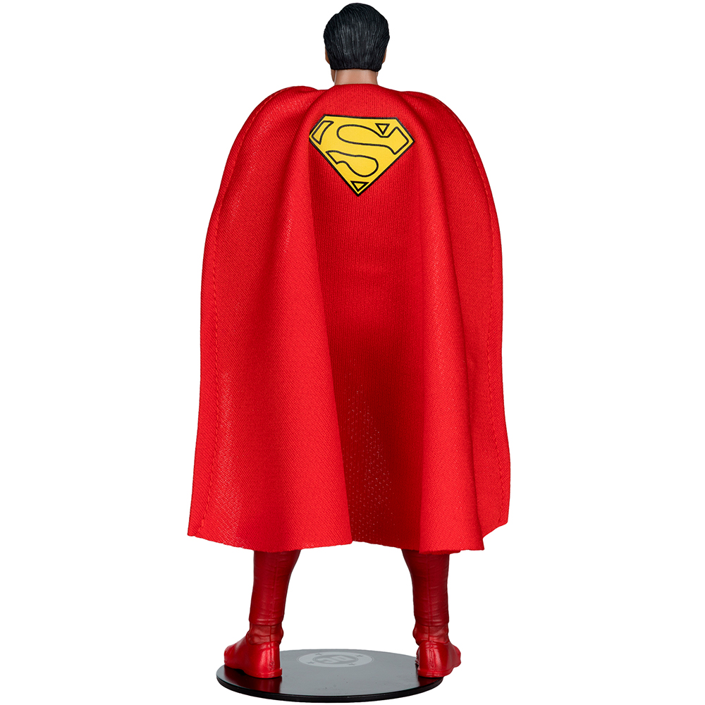 Superman-Figur von hinten, mit rotem Umhang und gelbem S-Logo.