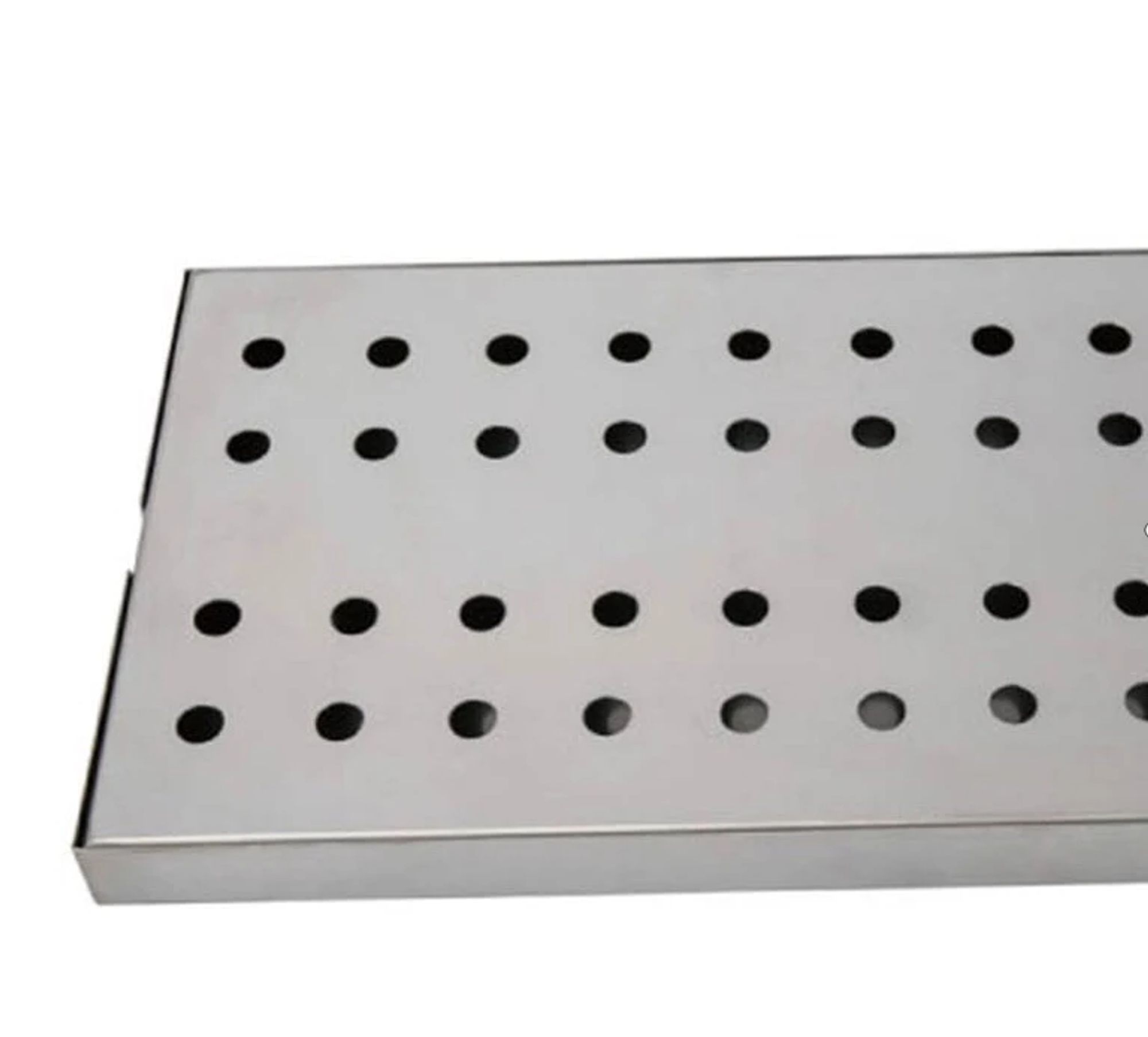 Silver rectangular tray with many small round holes.