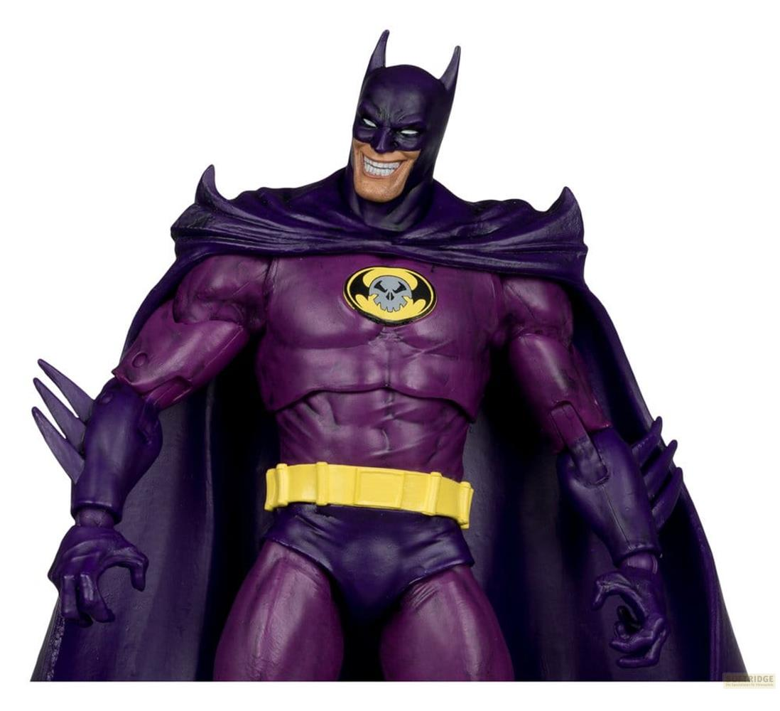 Eine Actionfigur von Batman in lila und gelb mit einem grinsenden Gesicht.