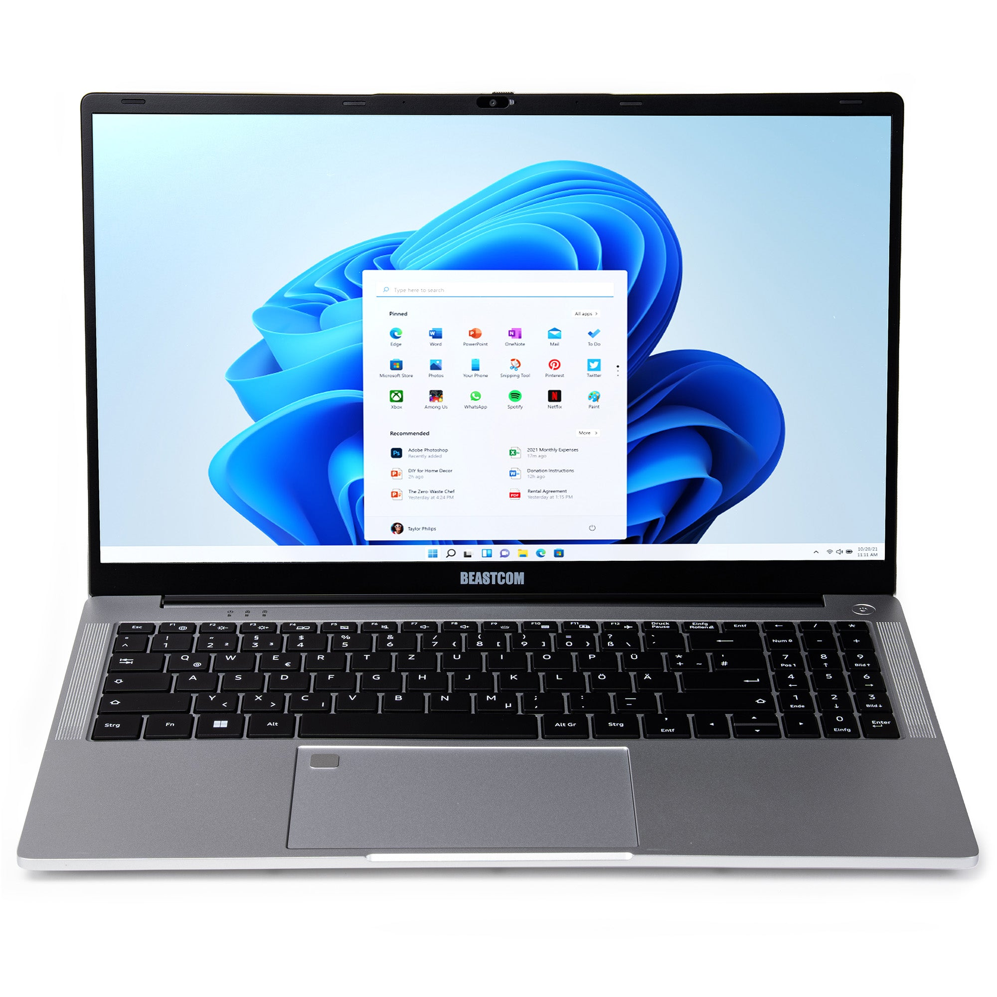 Ein geschlossener silberner Laptop mit Windows 11-Startmenü und Tastatur.