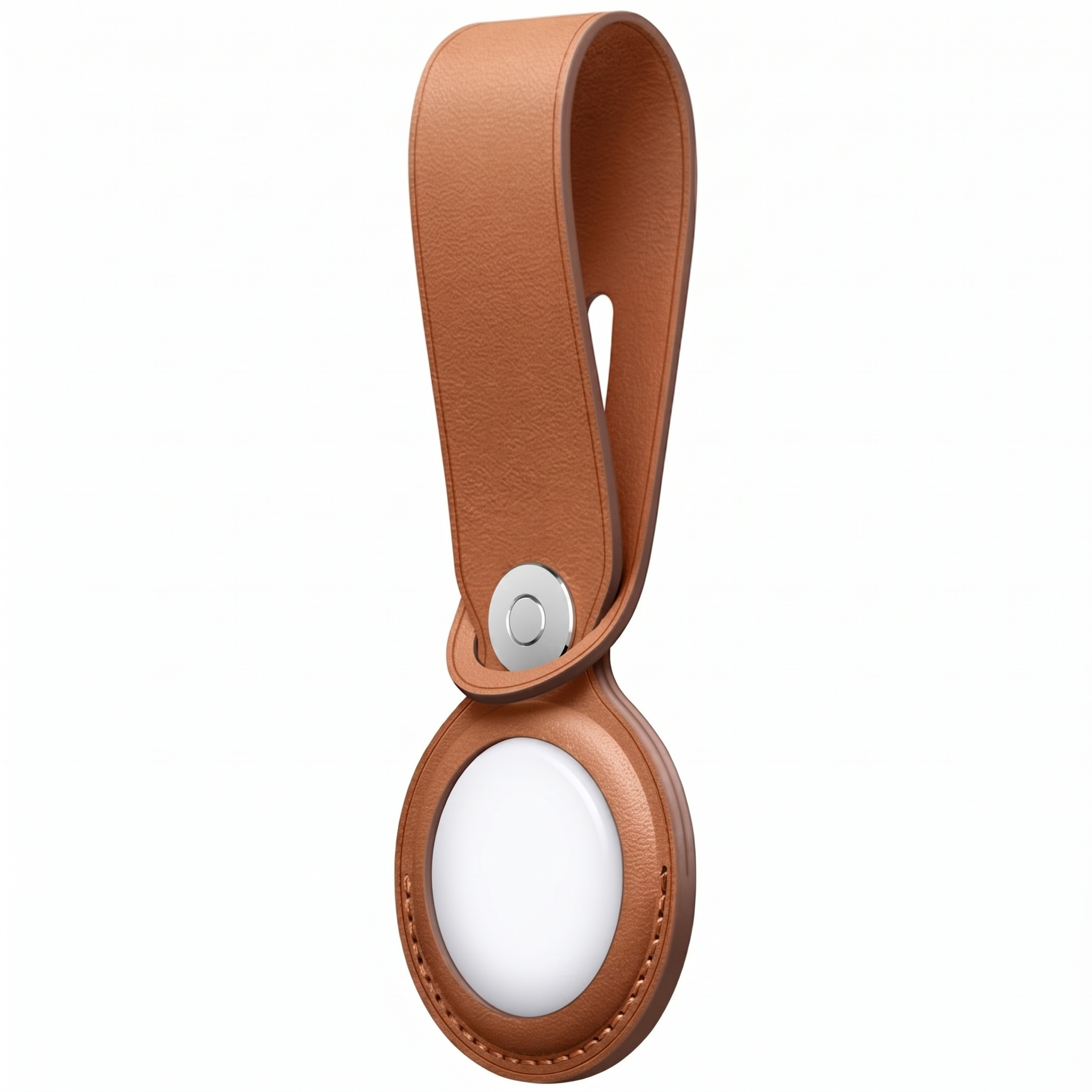 A brown leather fob with a silver button holding a white round object.