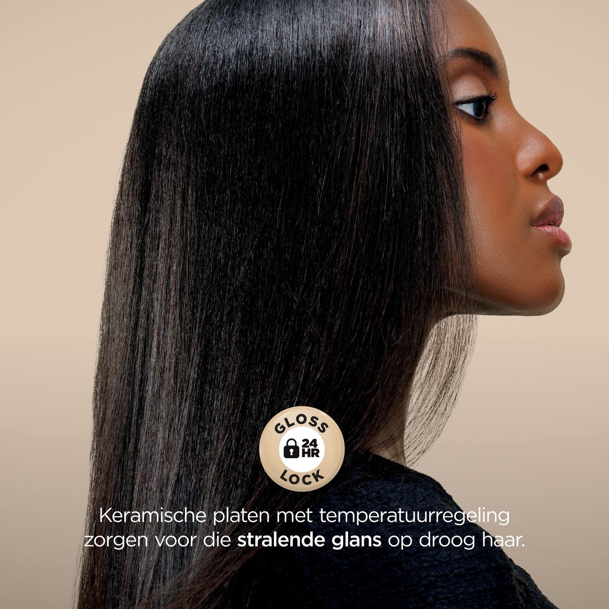 Donna con capelli neri e lucidi, vista di profilo. Gloss 24 HR Lock.