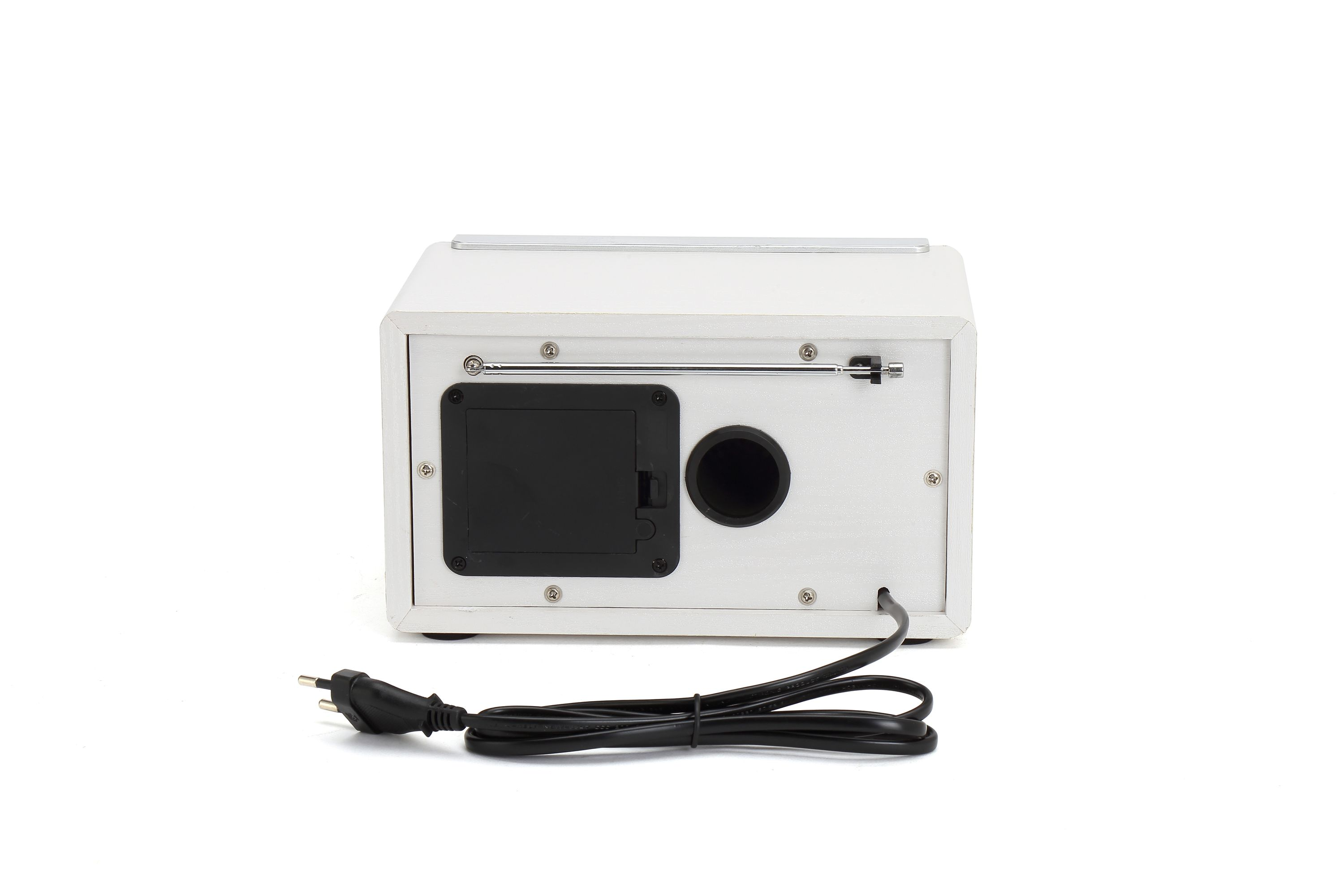 Back of a white radio with an extendable antenna, black cover, and cable.