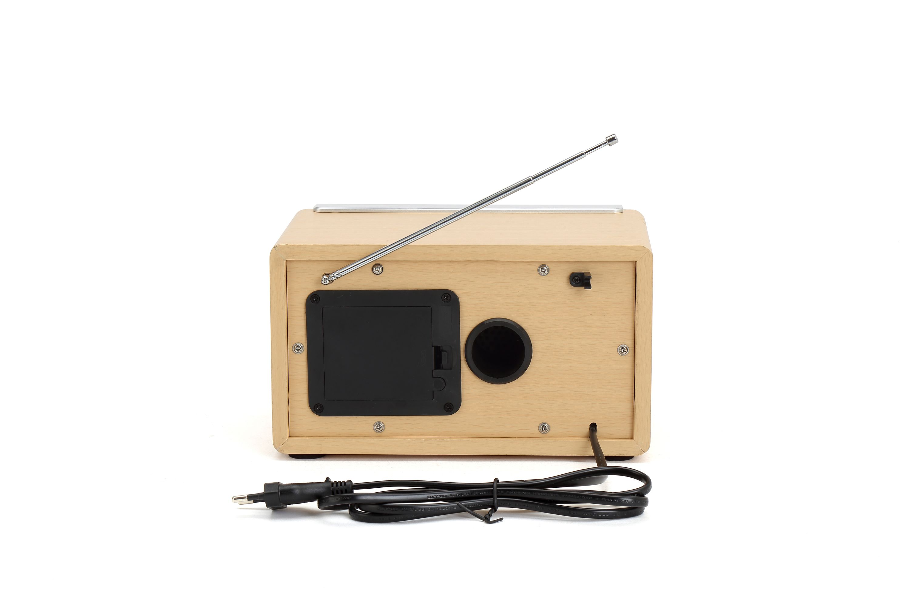 Back of a wooden radio with an extended antenna and cable.
