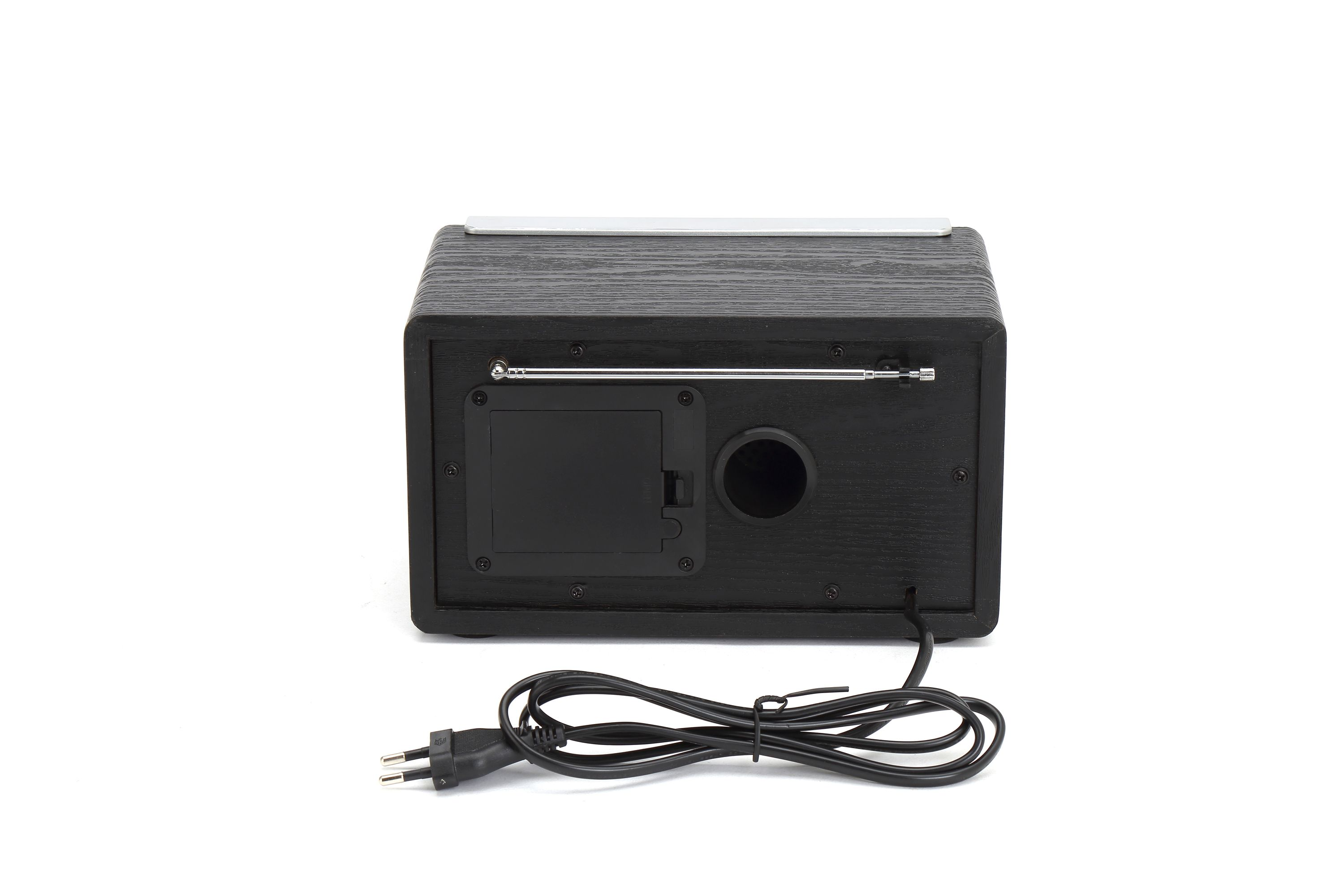 Back of a black wooden radio with a retractable antenna and power cord.
