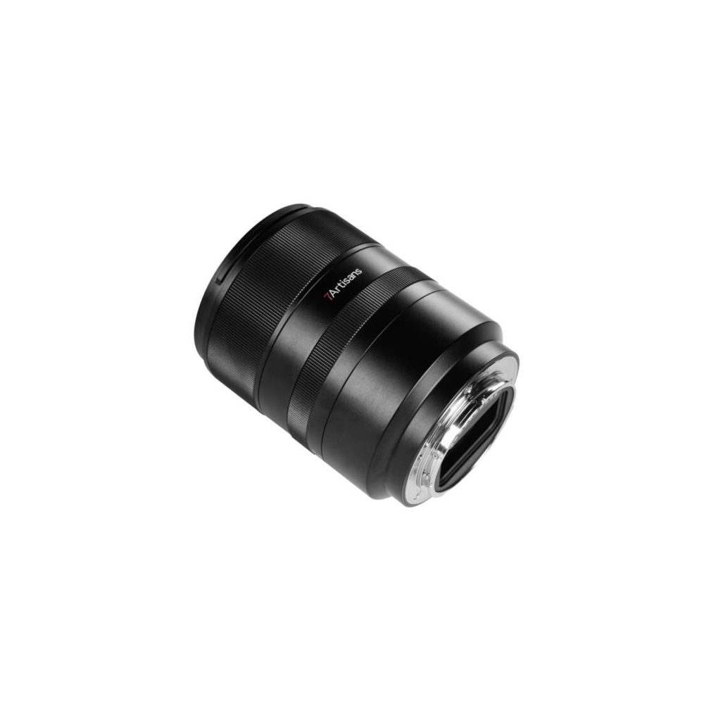 A black camera lens with a focus ring and silver mount on a white background.