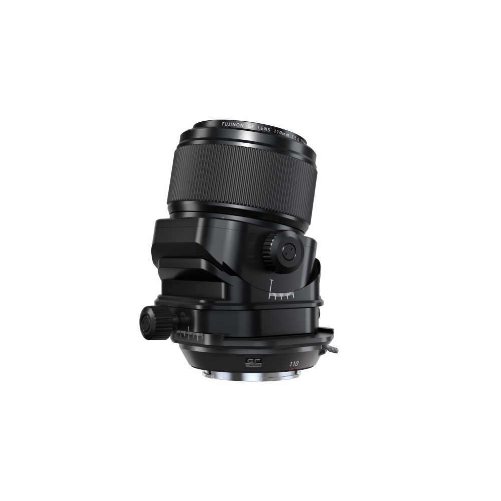 A black Fujinon GF lens with a tilt-shift adapter sits on a white background.