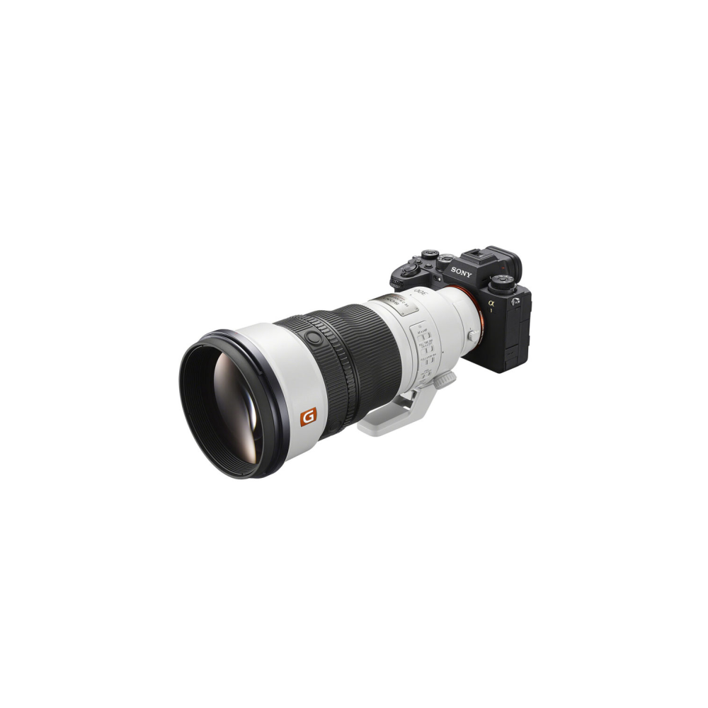 A white Sony camera with a large white telephoto lens and G Master logo.