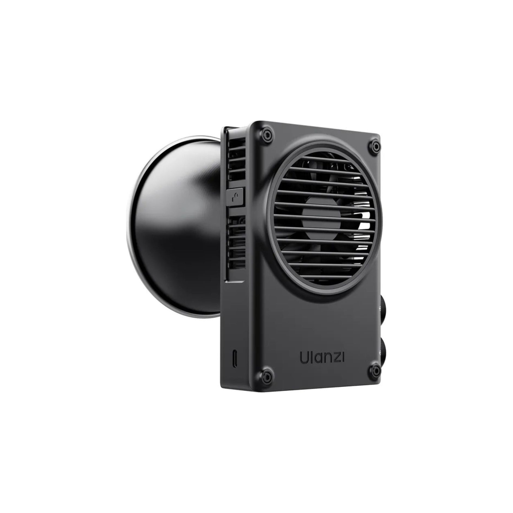 A black fan with vents and a round reflector on a white background.