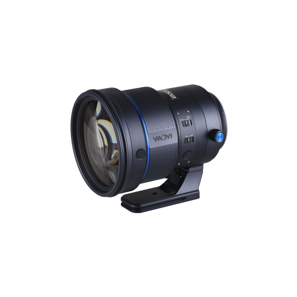 A black camera lens with blue accents sits on a white background.