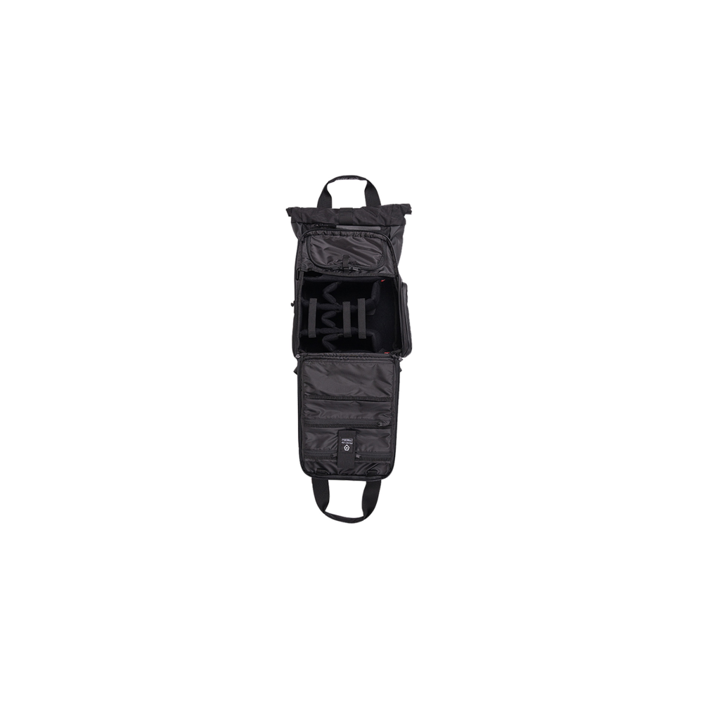 An open black backpack with compartments for gear.